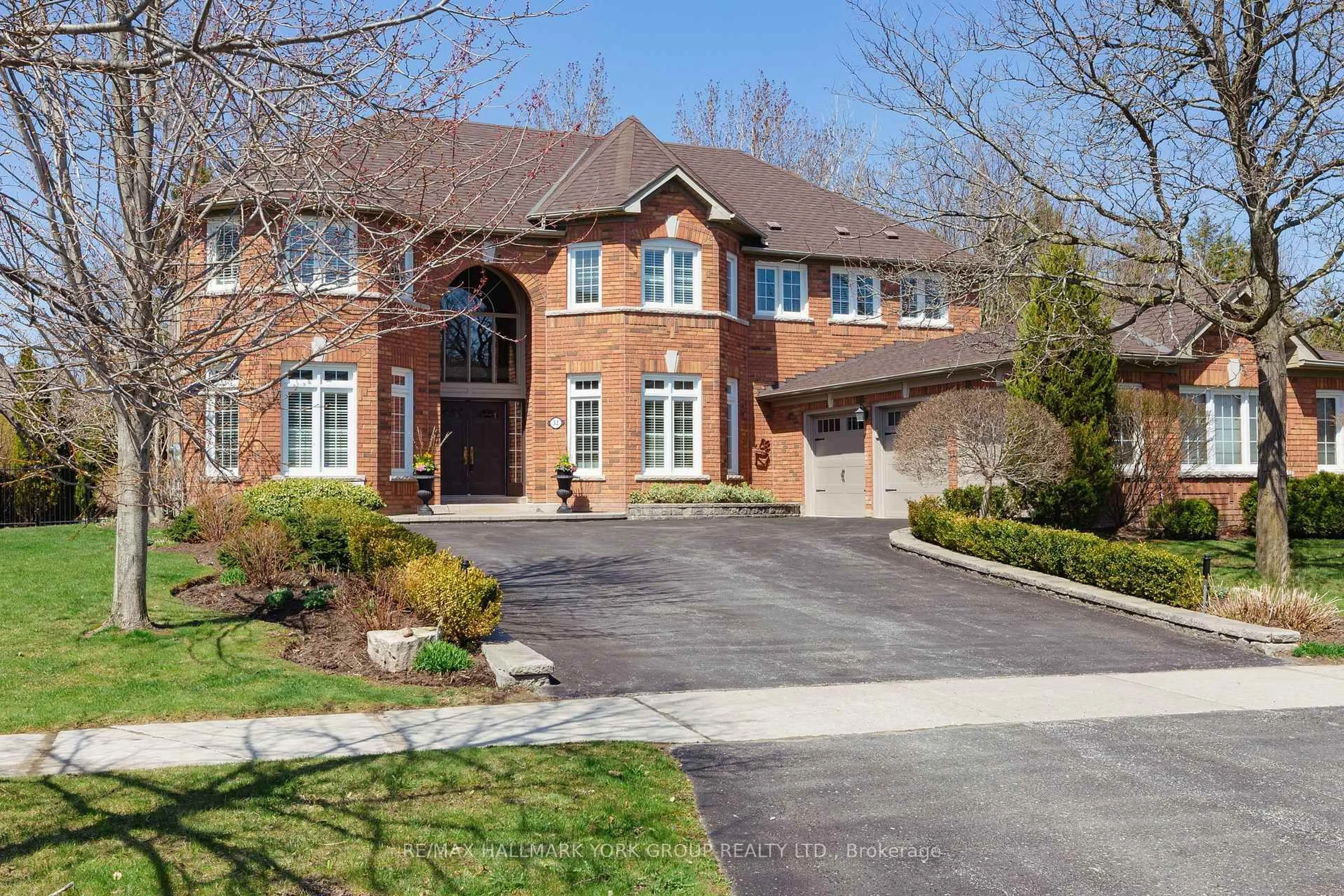 Home with brick exterior material, street for 52 Forester Cres, Markham Ontario L6C 1V2