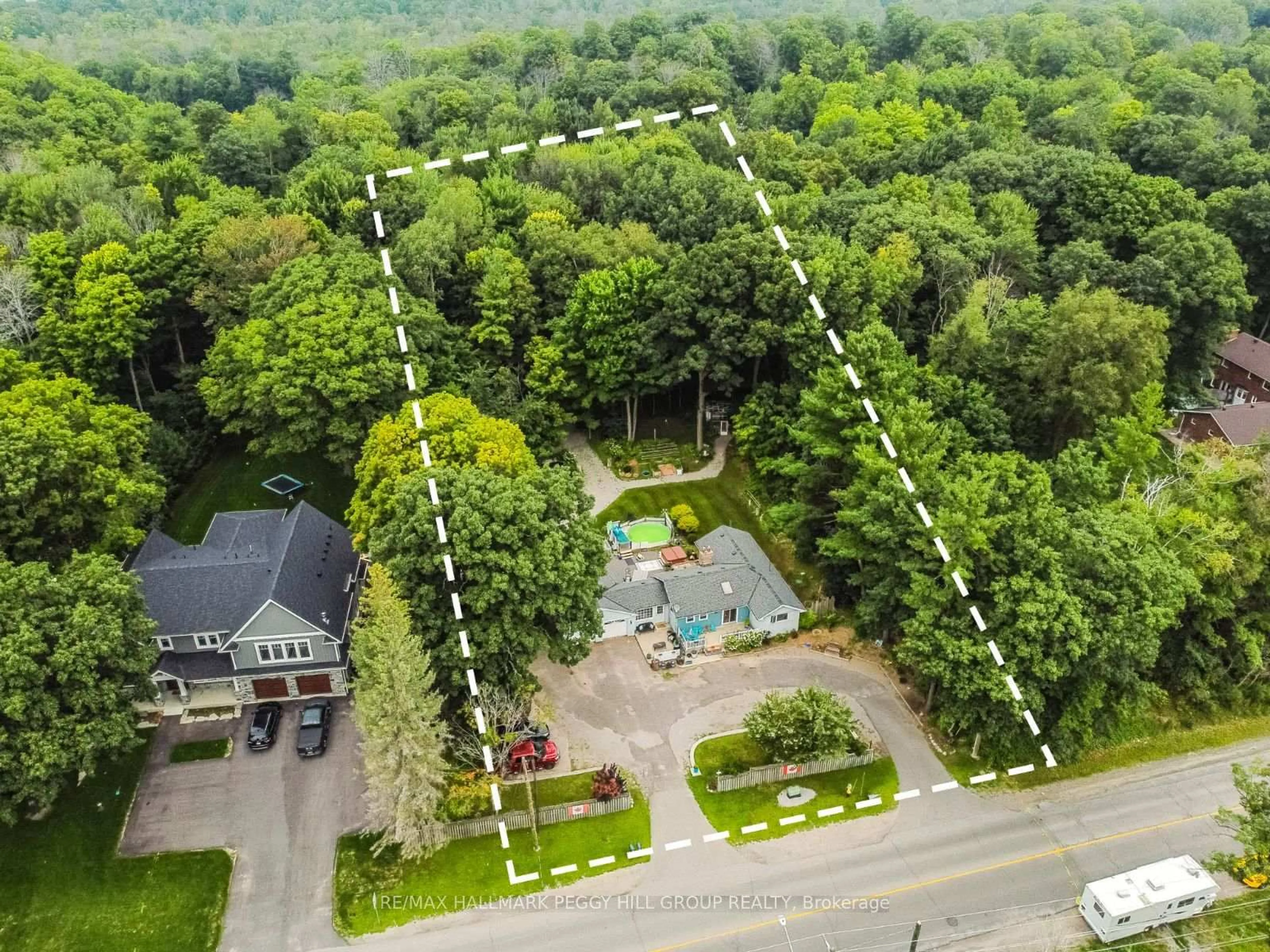 A pic from outside/outdoor area/front of a property/back of a property/a pic from drone, forest/trees view for 1776 BIG BAY POINT Rd, Innisfil Ontario L9S 2R4
