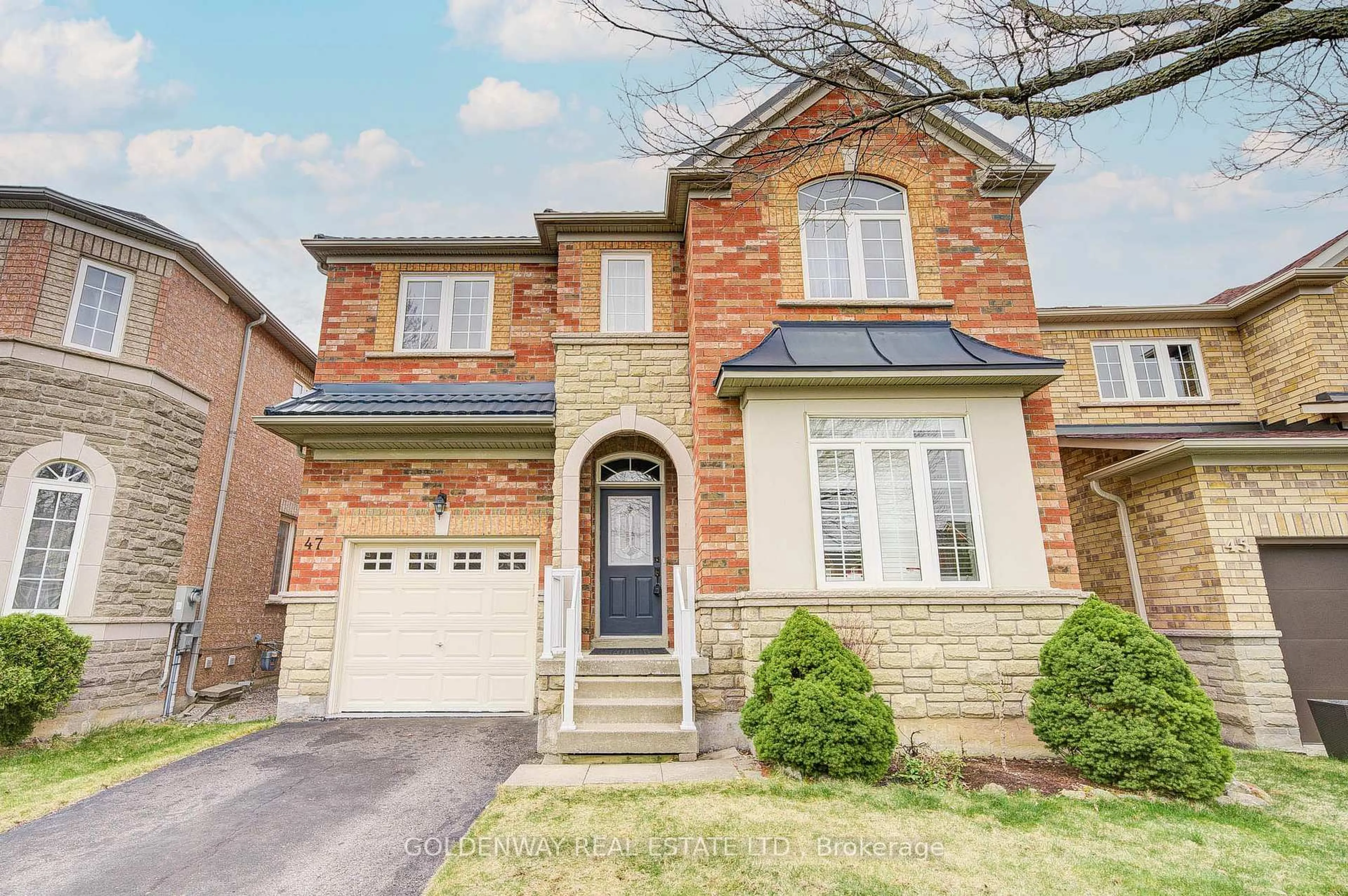 Home with brick exterior material, street for 47 Victoria Wood Ave, Markham Ontario L6E 1K2