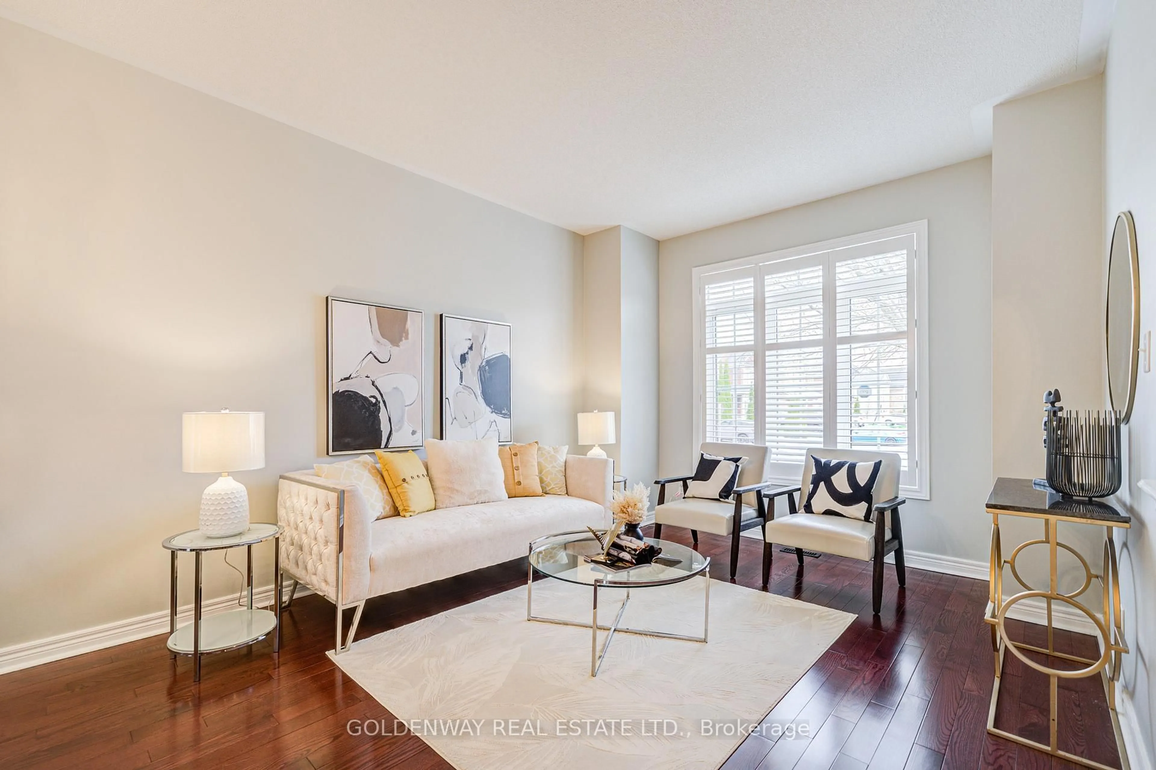 Living room with furniture, wood/laminate floor for 47 Victoria Wood Ave, Markham Ontario L6E 1K2