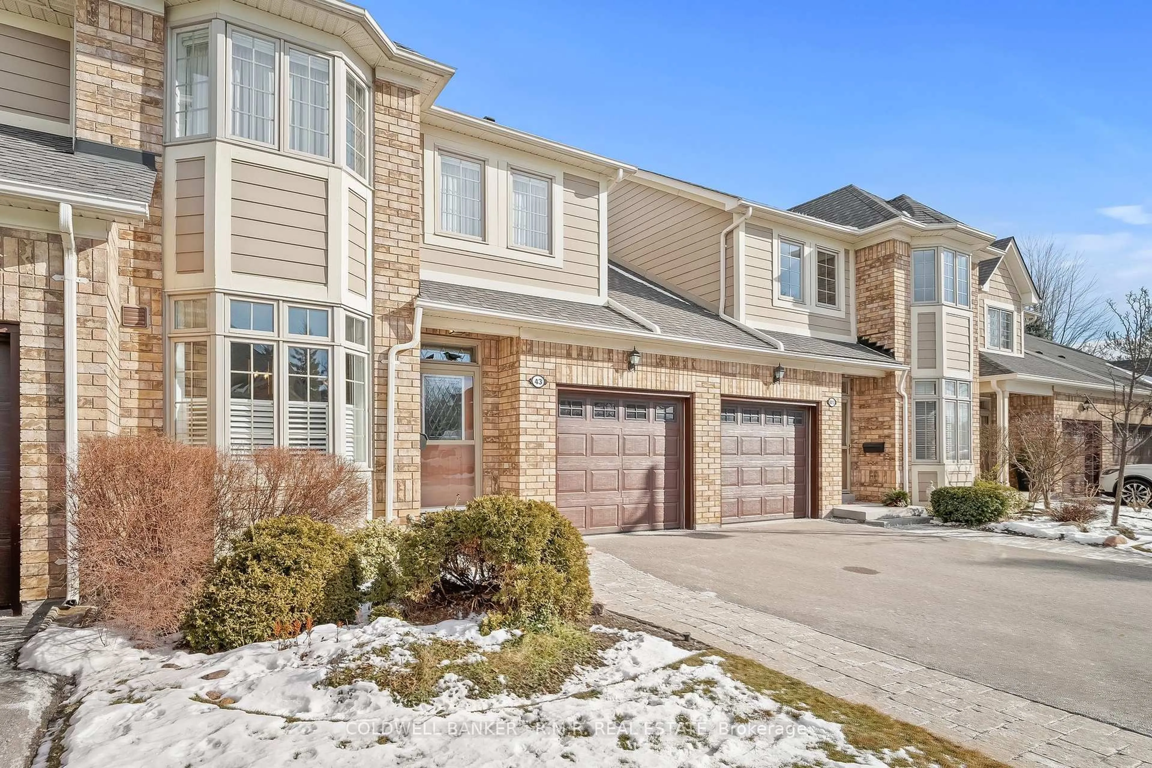 Home with brick exterior material, street for 43 Louisbourg Way, Markham Ontario L6E 2A2
