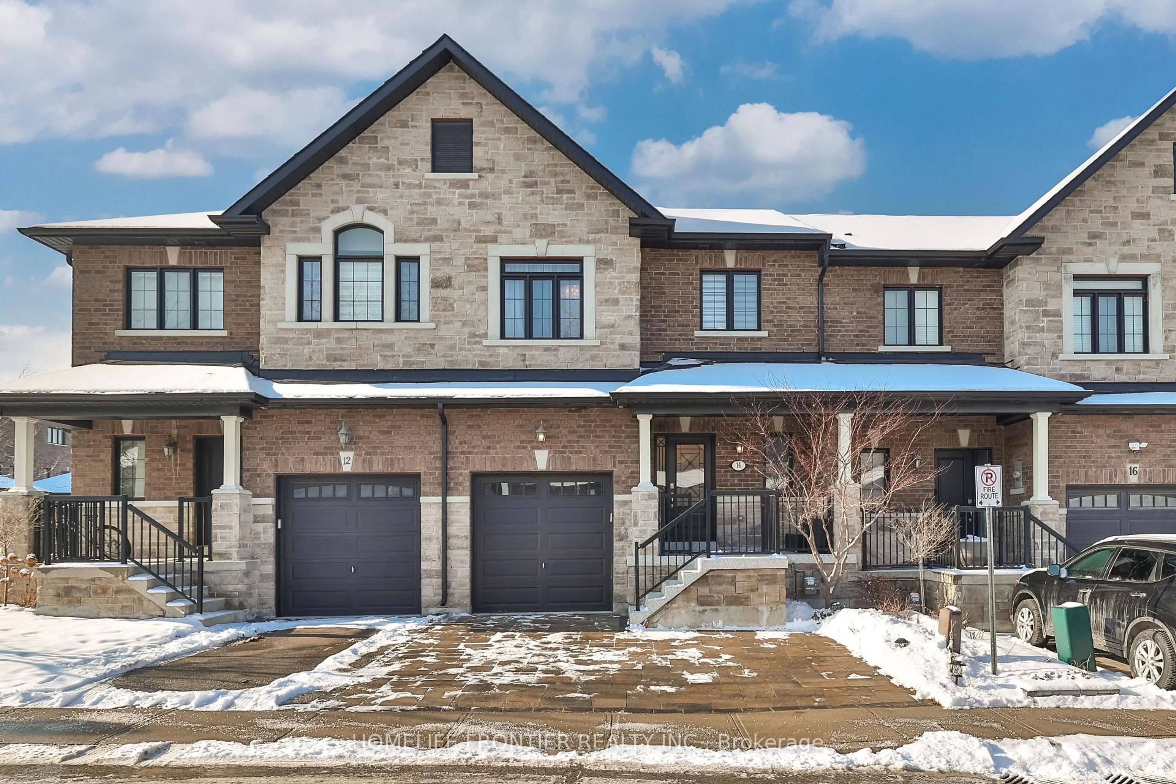 Home with brick exterior material, street for 14 Charmuse Lane, East Gwillimbury Ontario L9N 0N7