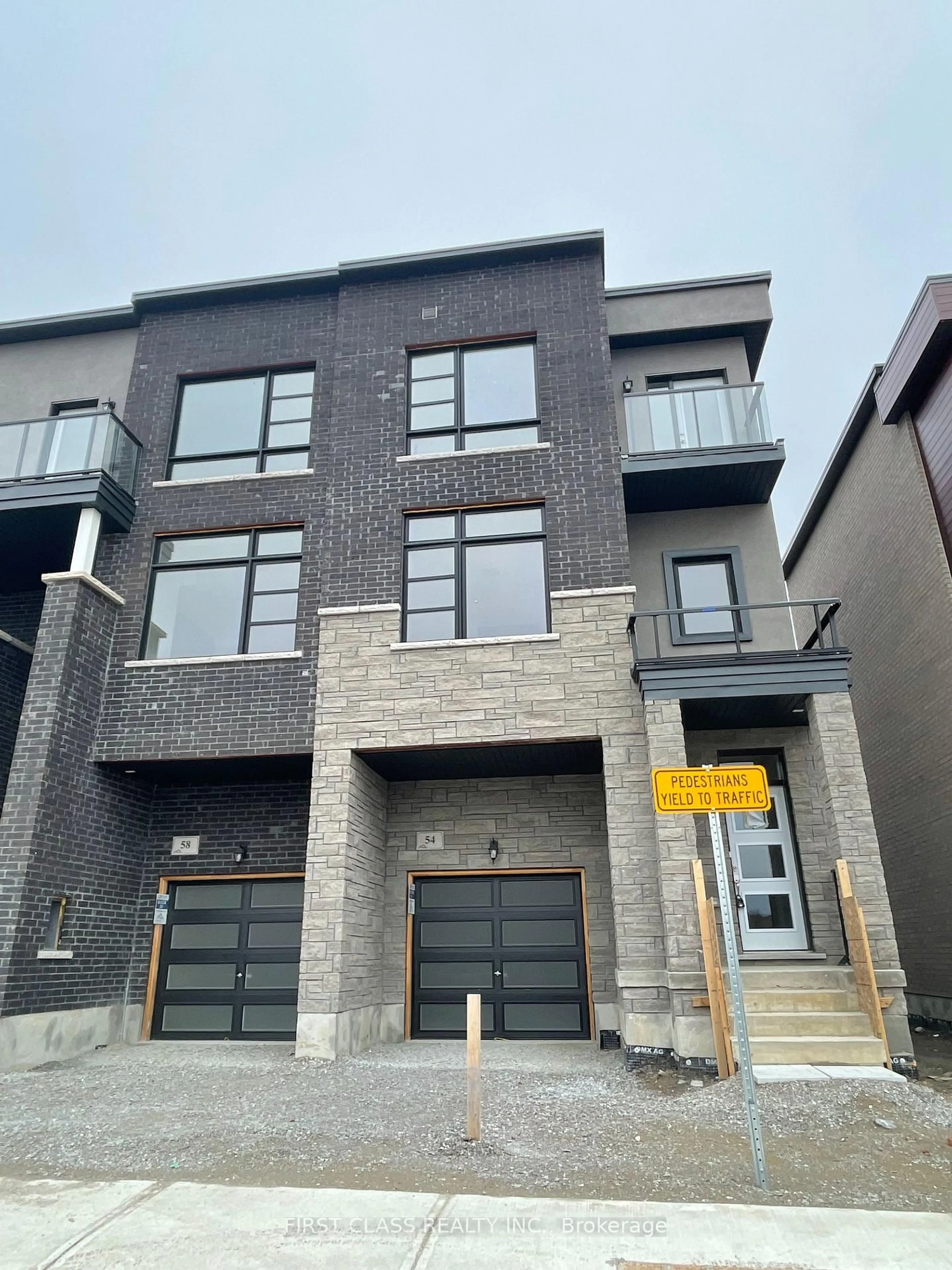 Home with brick exterior material, street for 54 Wascana Rd, Vaughan Ontario L4L 1A7