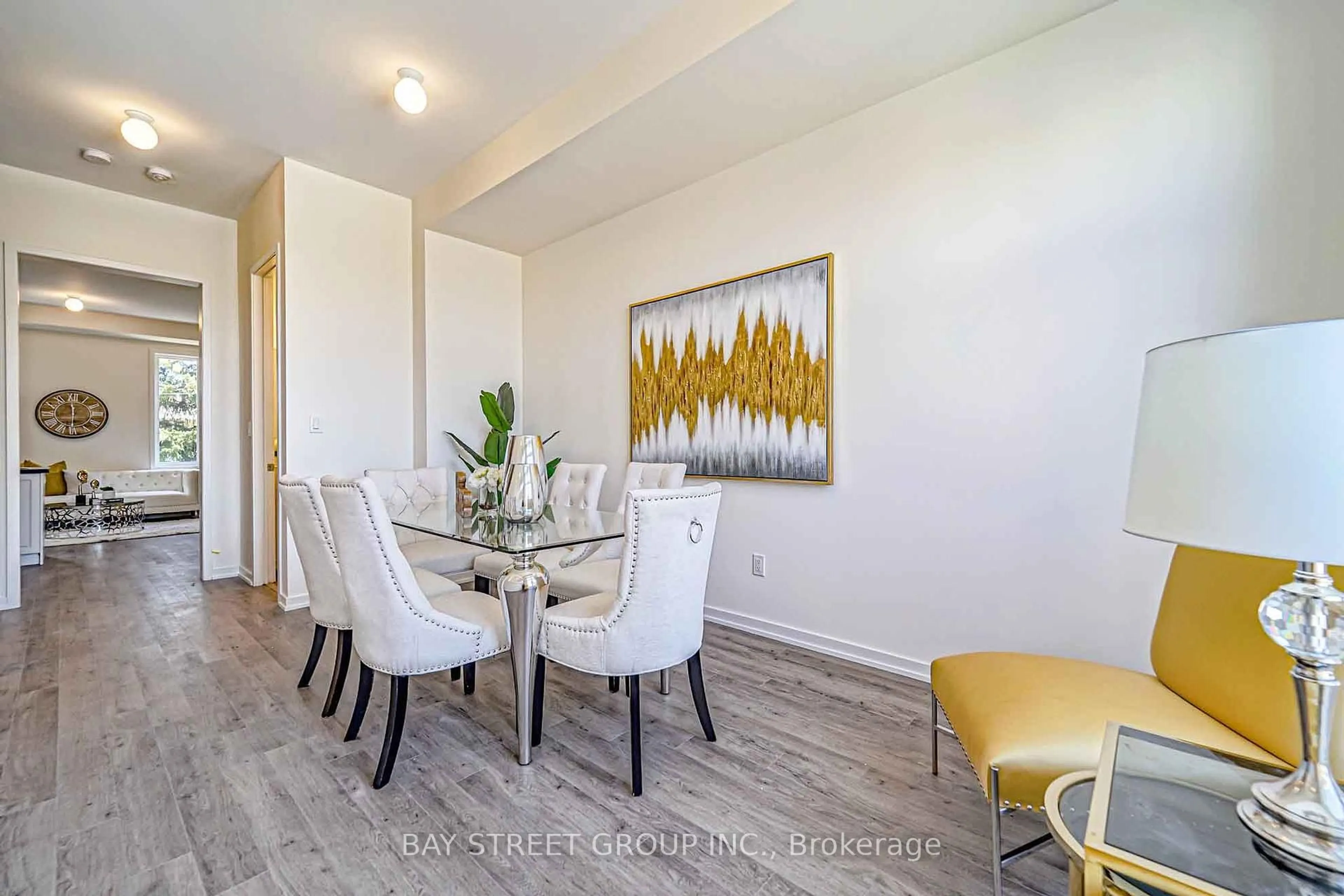 Dining room, wood/laminate floor for 54 Pantheon Lane, Markham Ontario L6E 0V3