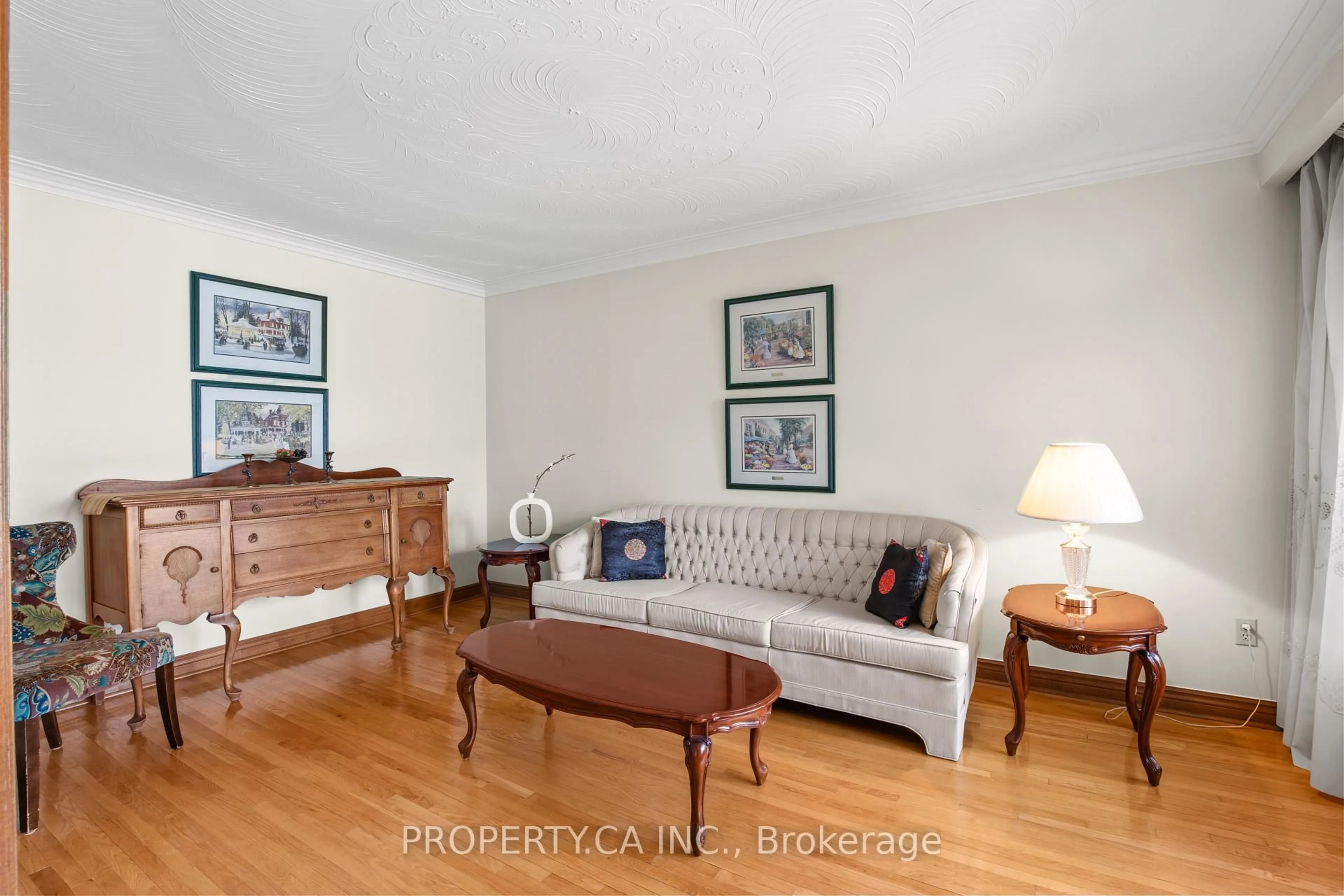 Living room with furniture, wood/laminate floor for 115 Forest Dr, Vaughan Ontario L4L 3Z6