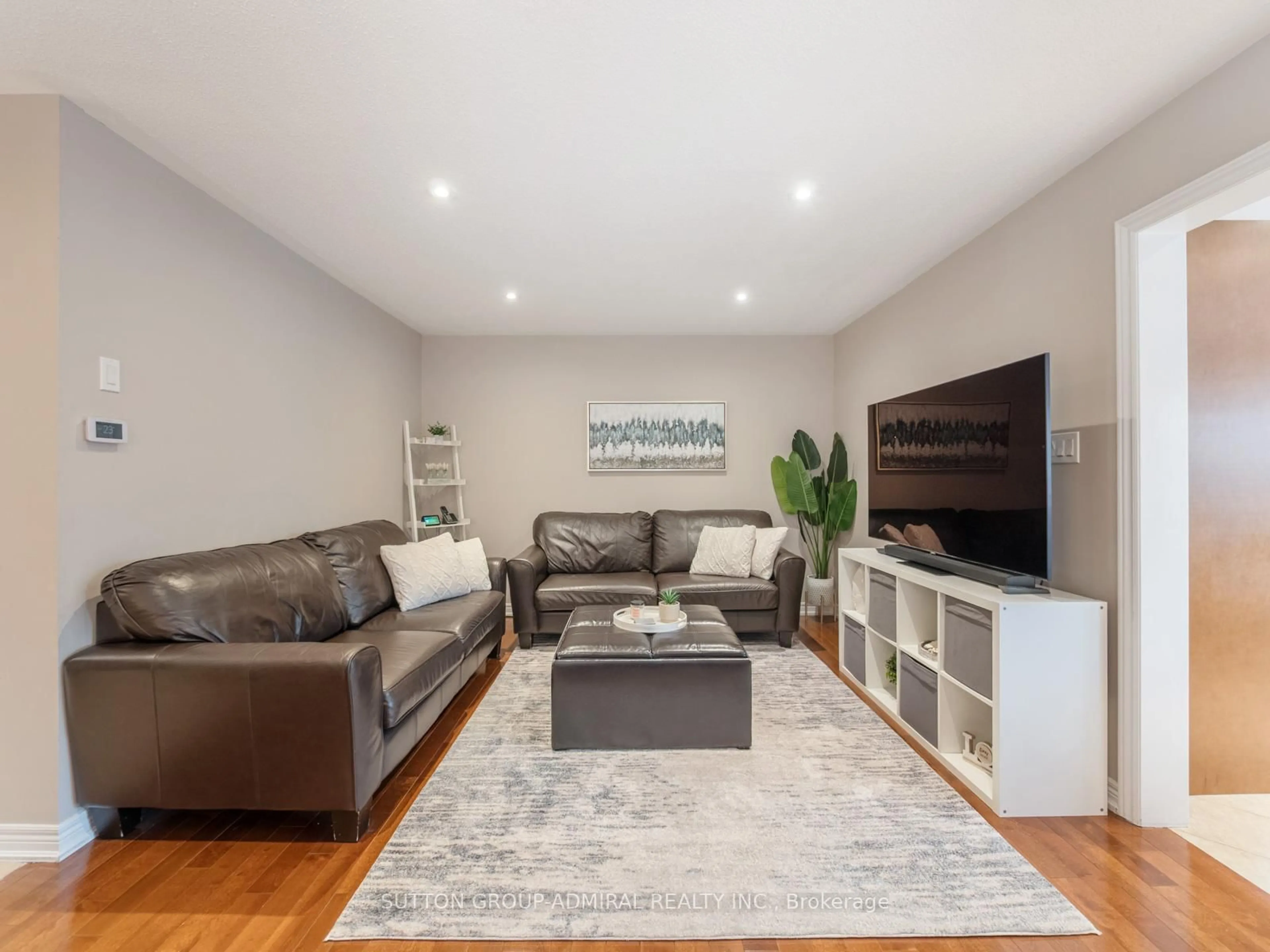 Living room with furniture, wood/laminate floor for 59 Orion Ave, Vaughan Ontario L4H 0B8