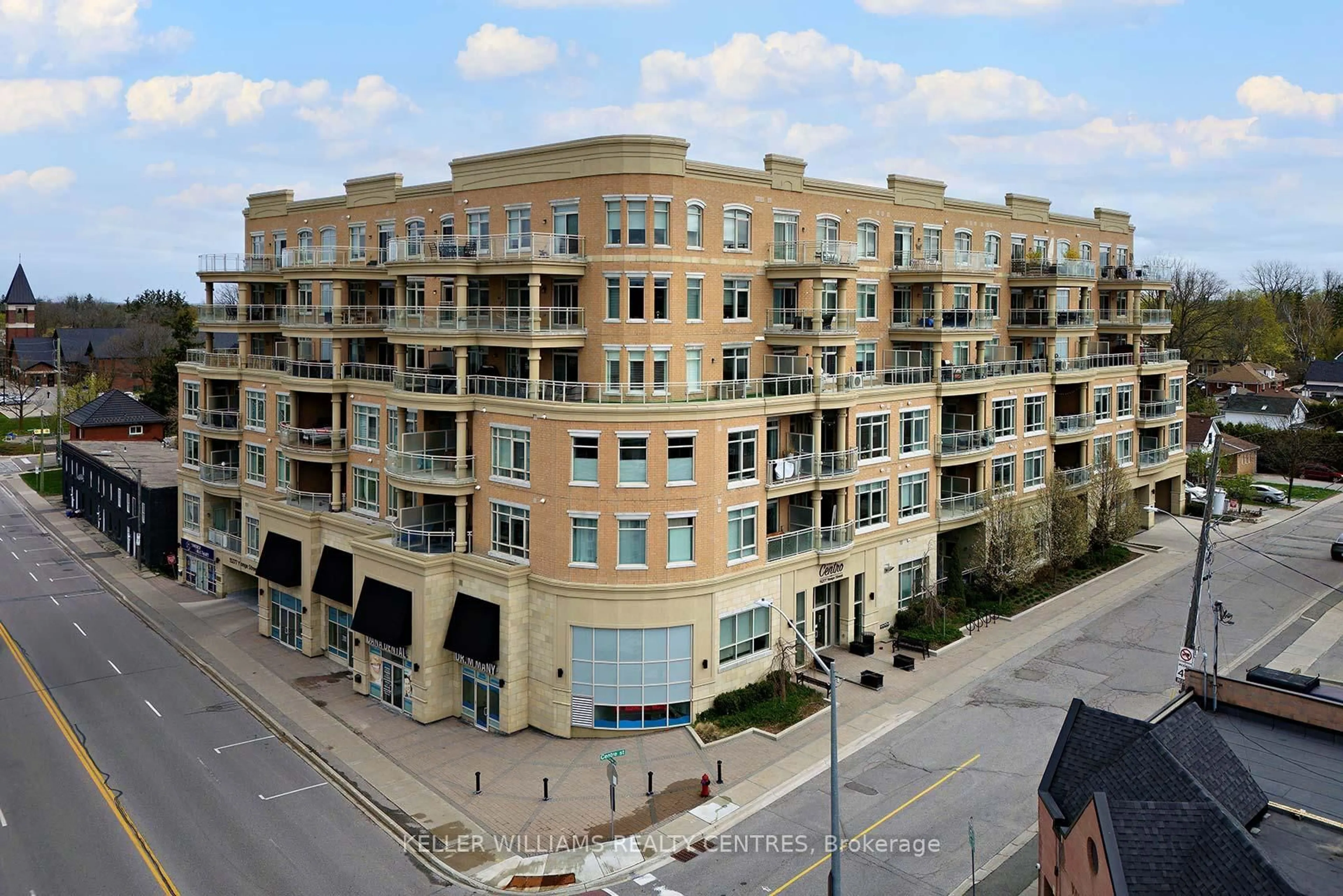 A pic from outside/outdoor area/front of a property/back of a property/a pic from drone, building for 15277 Yonge St #702A, Aurora Ontario L4G 1Y3