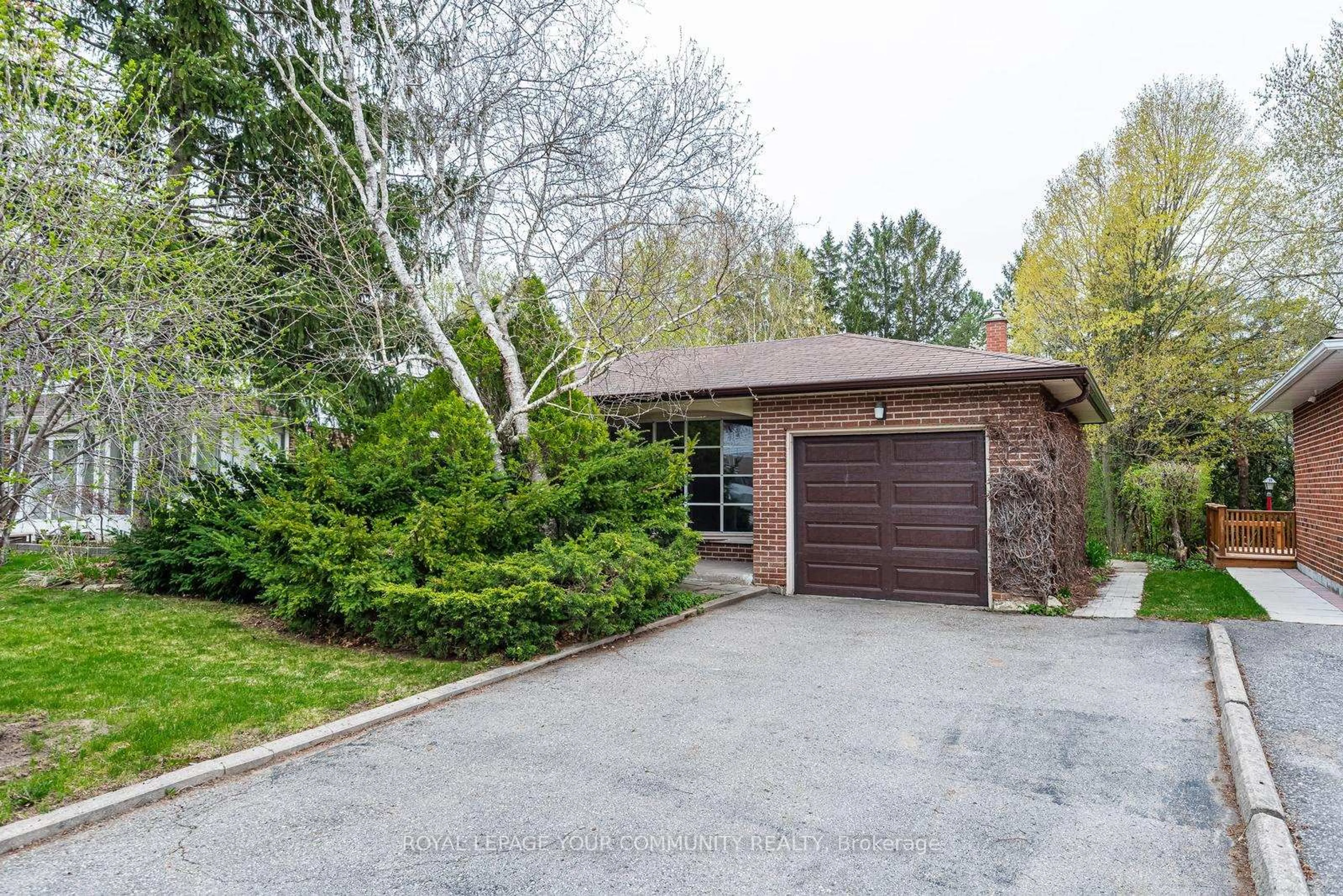 Home with brick exterior material, street for 41 Romfield Crct, Markham Ontario L3T 3H4