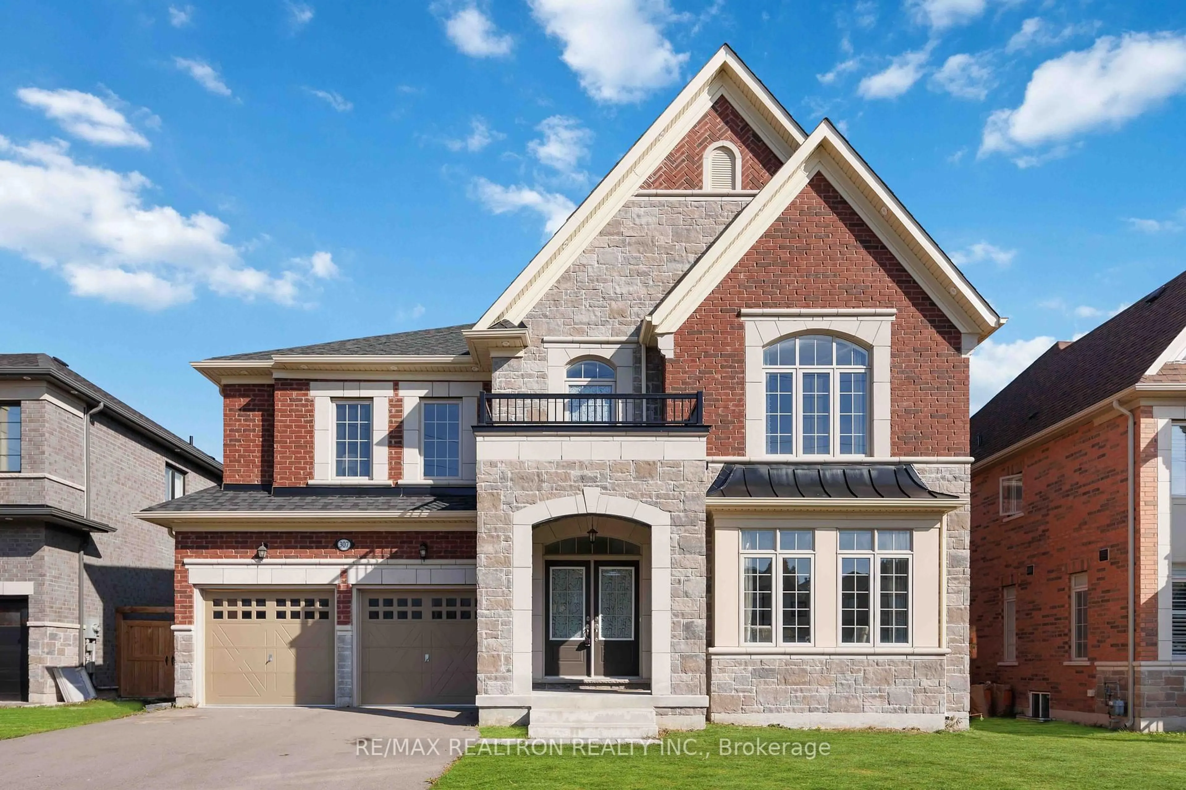 Home with brick exterior material, street for 307 Reg Harrison Tr, Newmarket Ontario L3X 0M2