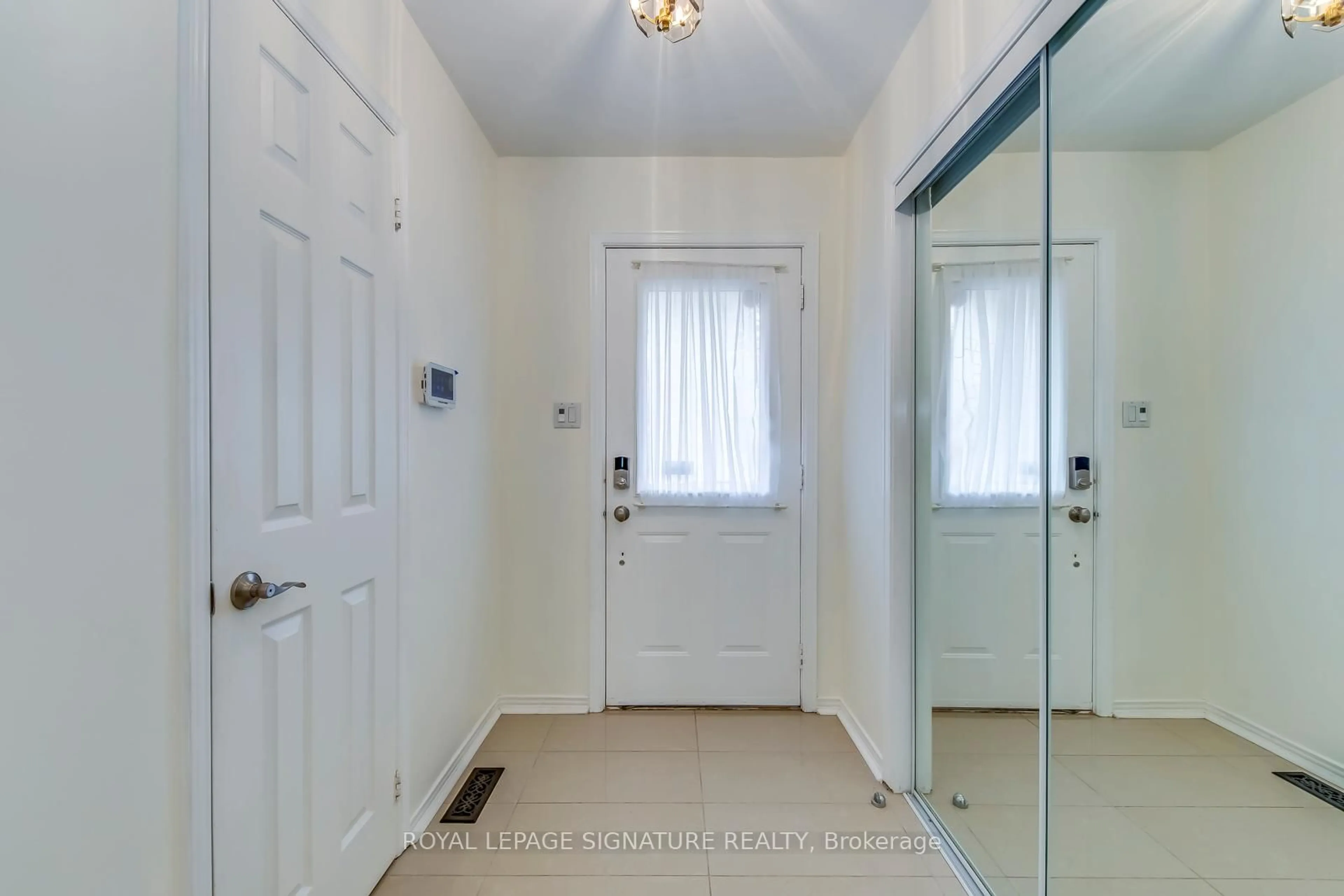 Indoor entryway for 23 Waterbridge Lane, Markham Ontario L3R 8W9