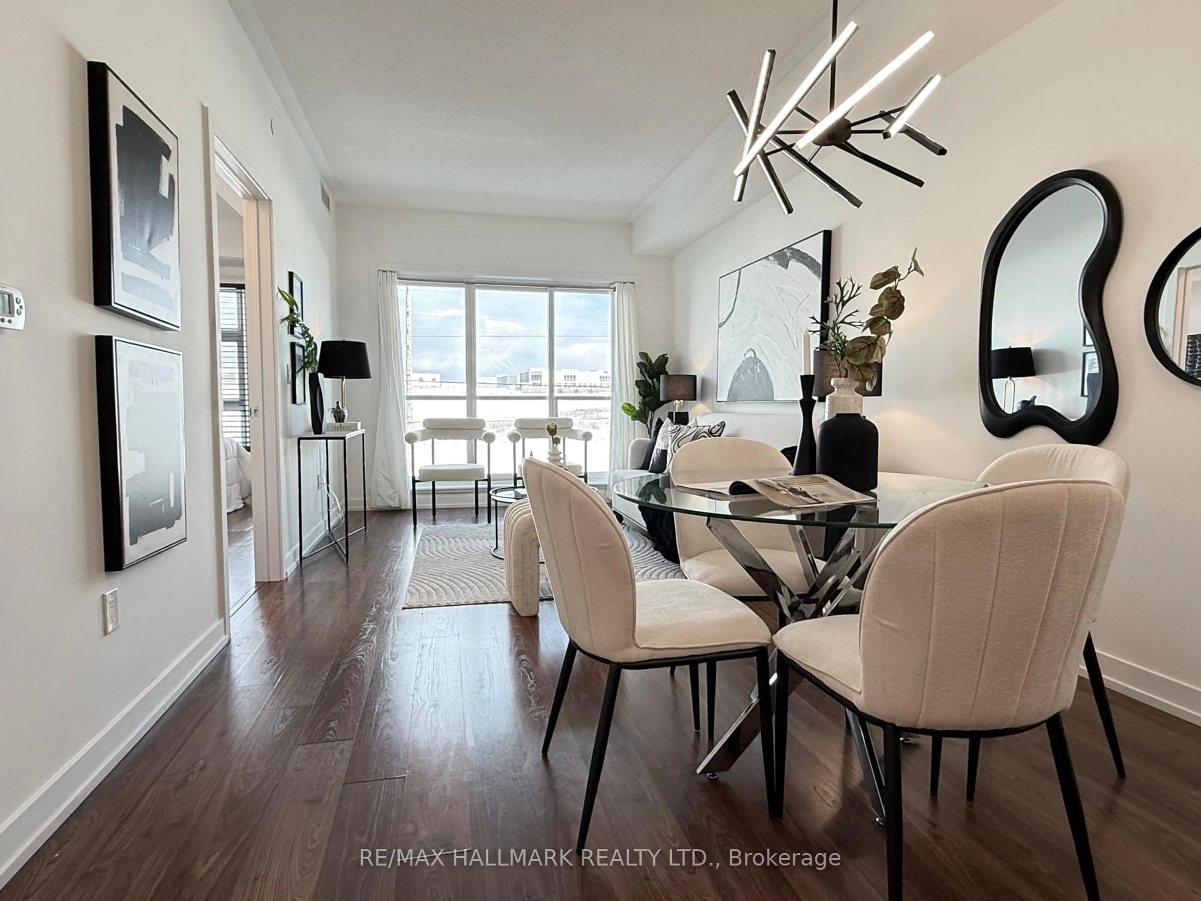 Dining room, wood/laminate floor for 555 William Graham Dr #314, Aurora Ontario L4G 3L1