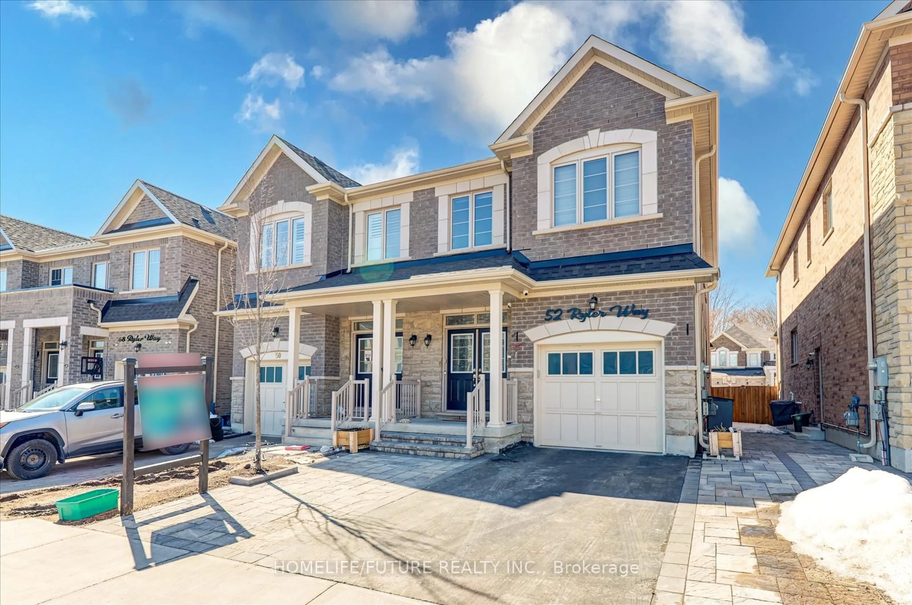 Home with brick exterior material, street for 52 Ryler Way, Markham Ontario L3S 0E7