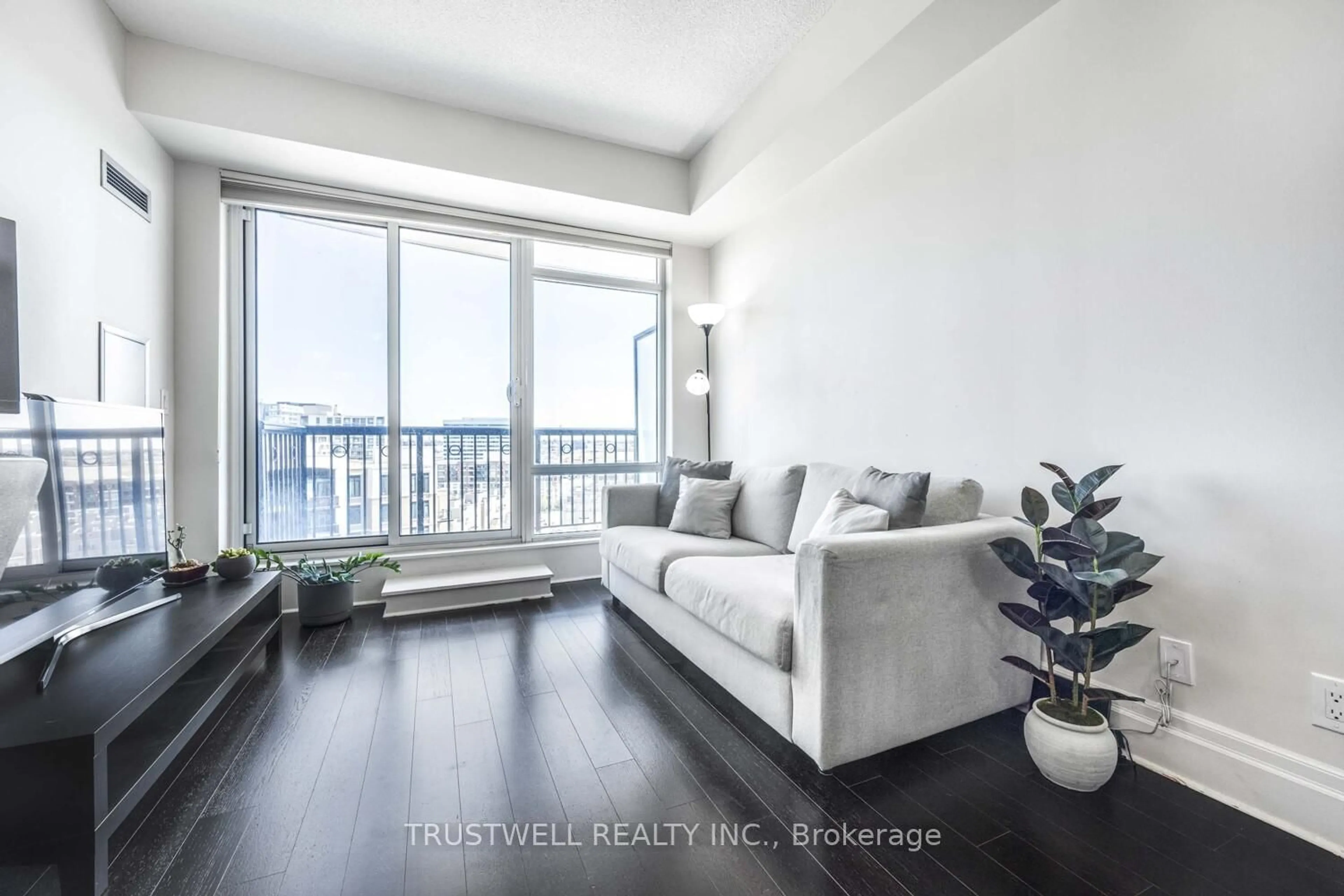 Living room with furniture, wood/laminate floor for 151 Upper Duke Cres #1207, Markham Ontario L6G 0E1