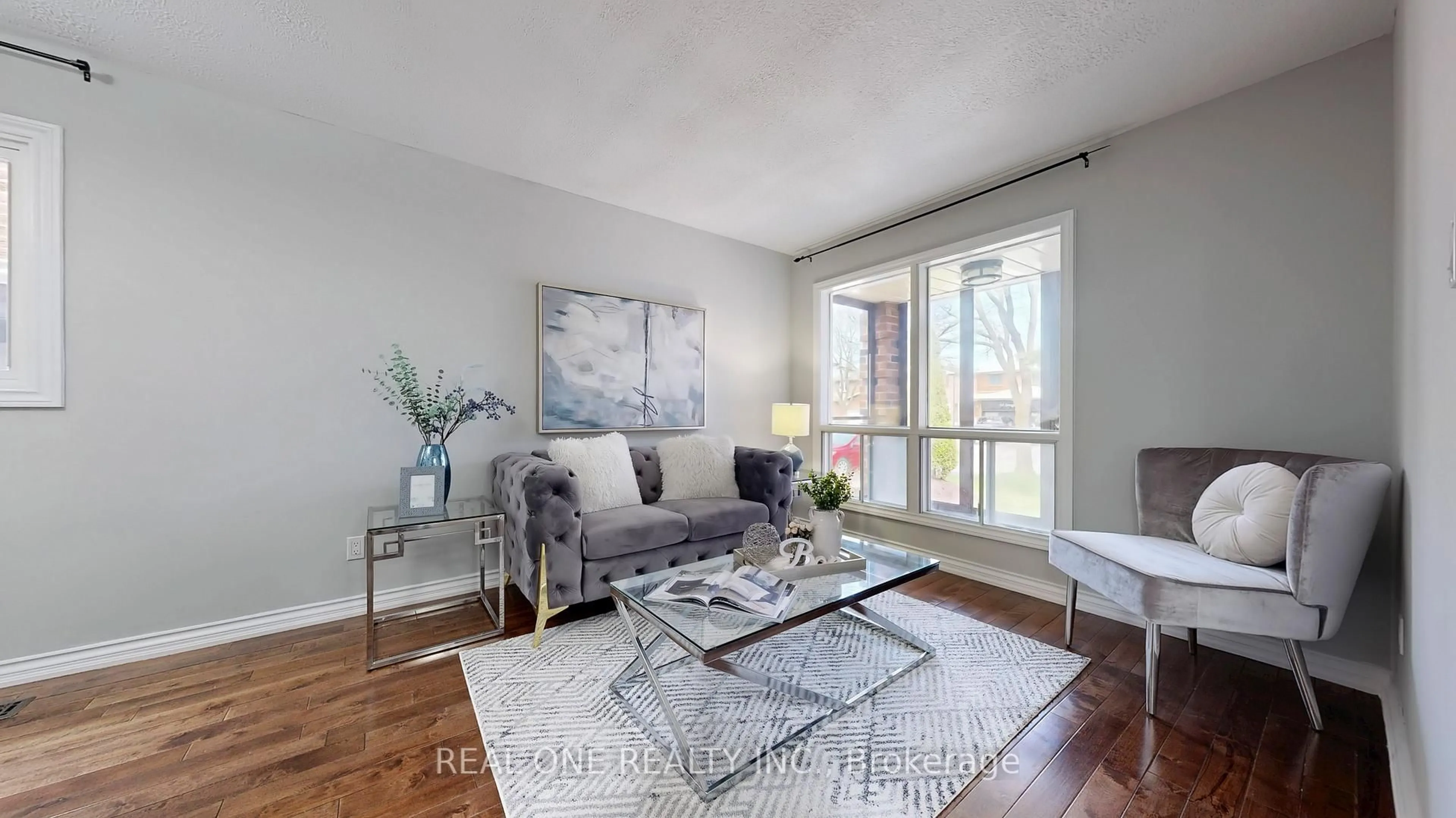 Living room with furniture, wood/laminate floor for 90 Spragg Circ, Markham Ontario L3P 5W5