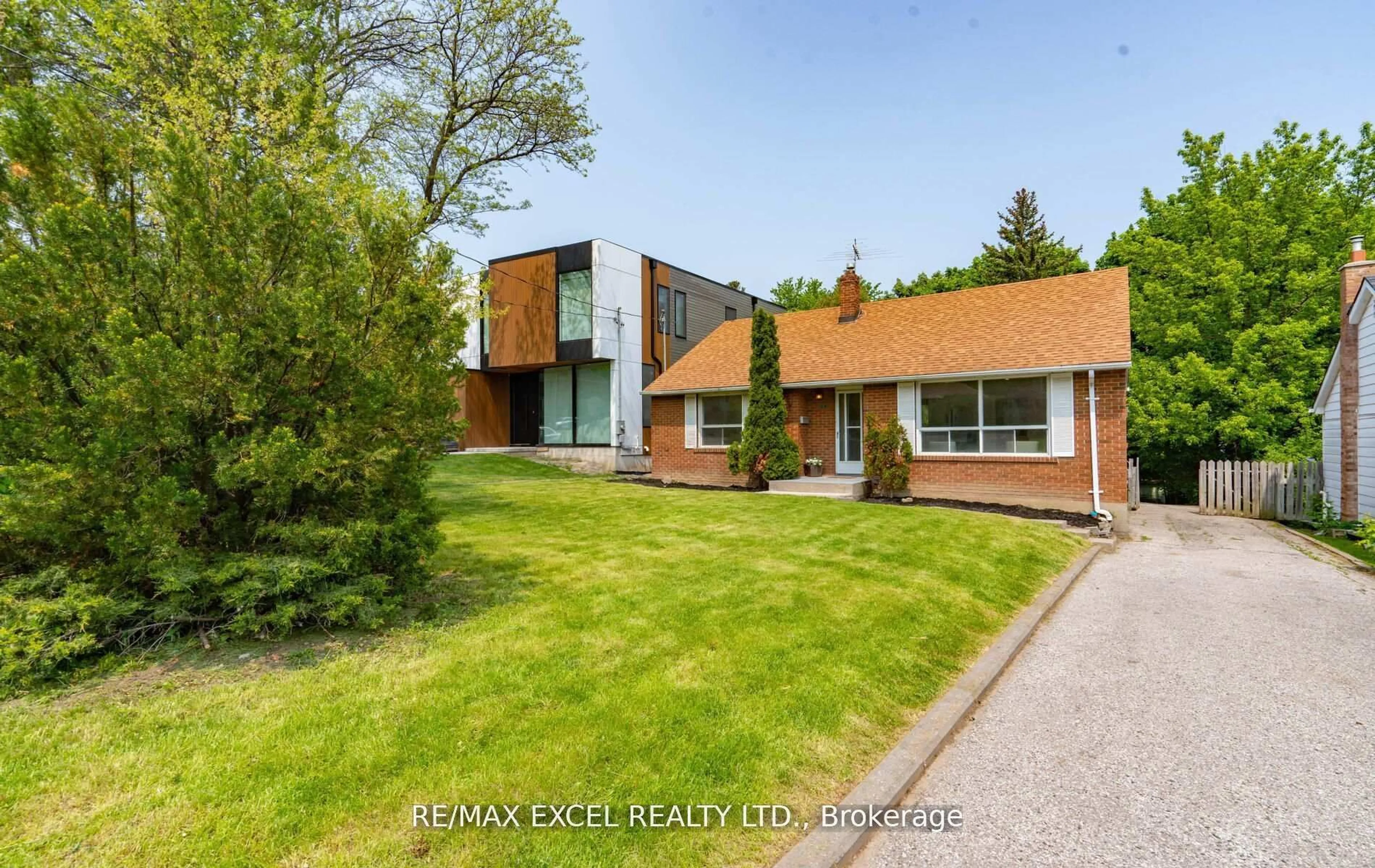 Home with brick exterior material, street for 104 Highland Park Blvd, Markham Ontario L3T 1B7