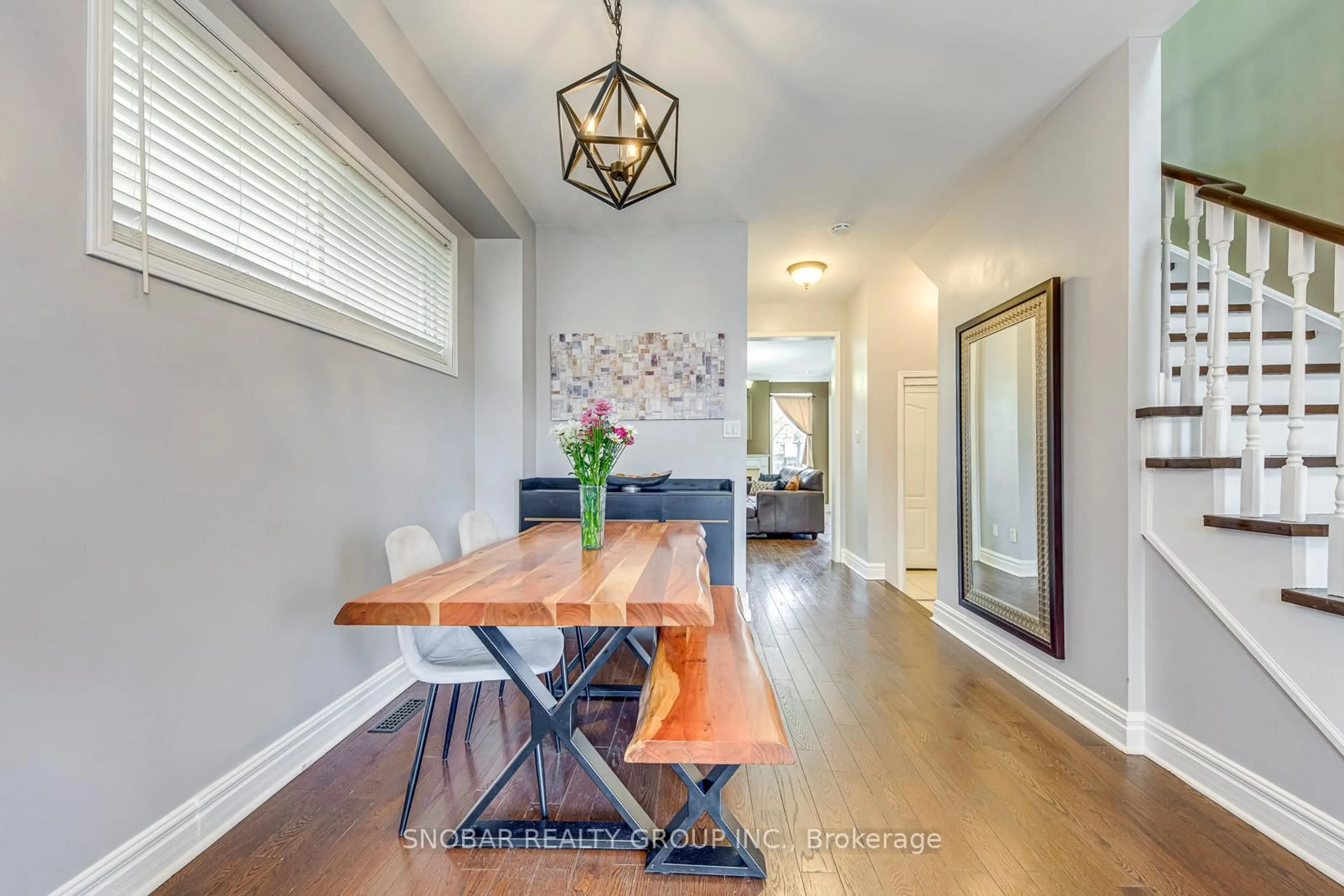 Dining room, wood/laminate floor for 62 Bunting Dr, Vaughan Ontario L4H 2E8
