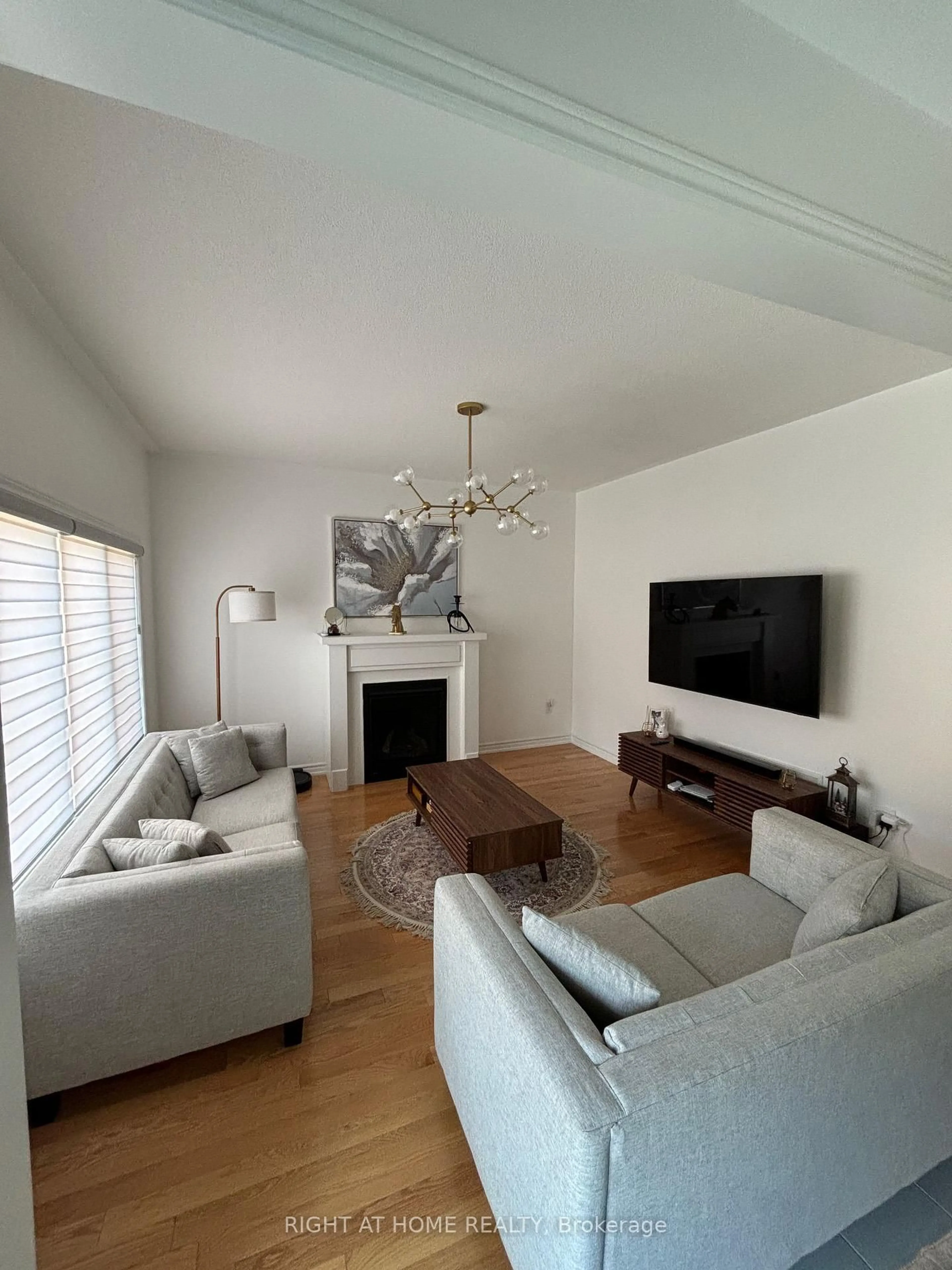 Living room with furniture, wood/laminate floor for 378 Danny Wheeler Blvd, Georgina Ontario L4P 0K2