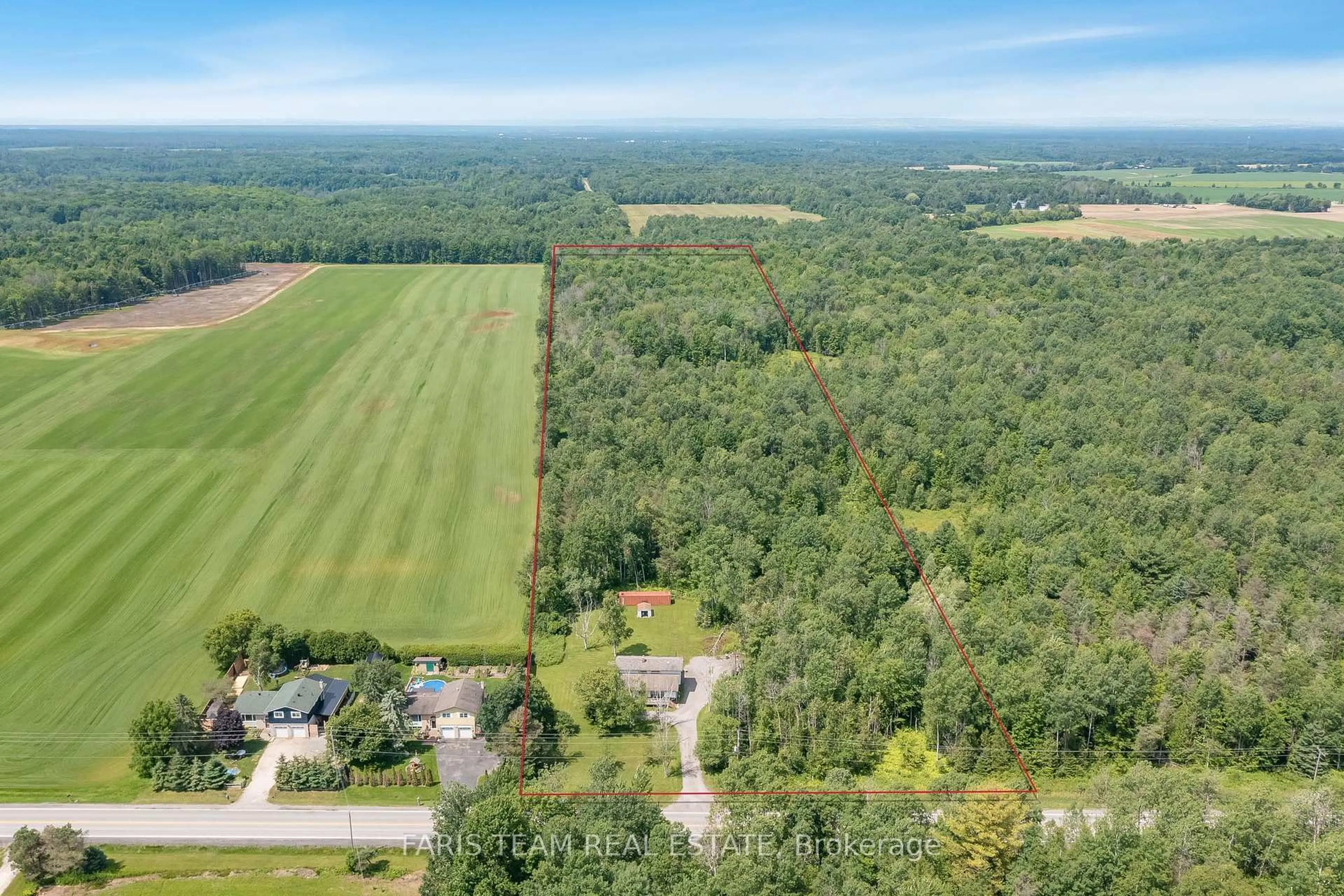 A pic from outside/outdoor area/front of a property/back of a property/a pic from drone, forest/trees view for 7750 County 56 Rd, Essa Ontario L0M 1T0