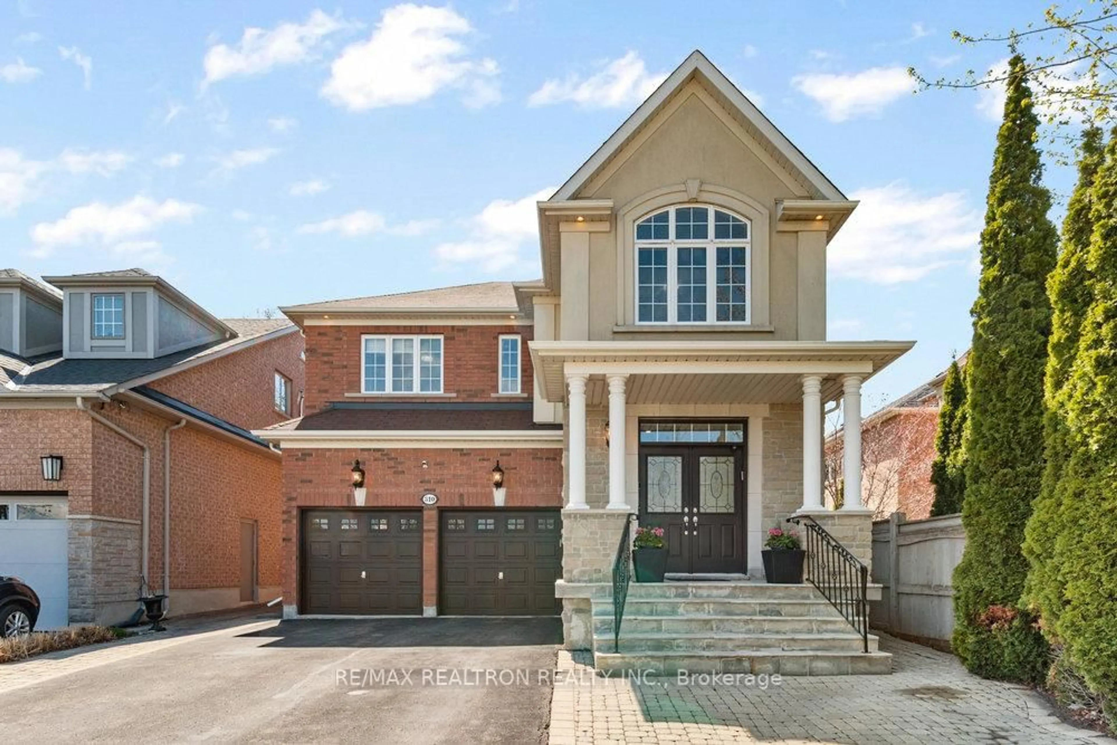 Home with brick exterior material, street for 310 Thornhill Woods Dr, Vaughan Ontario L4J 8V6