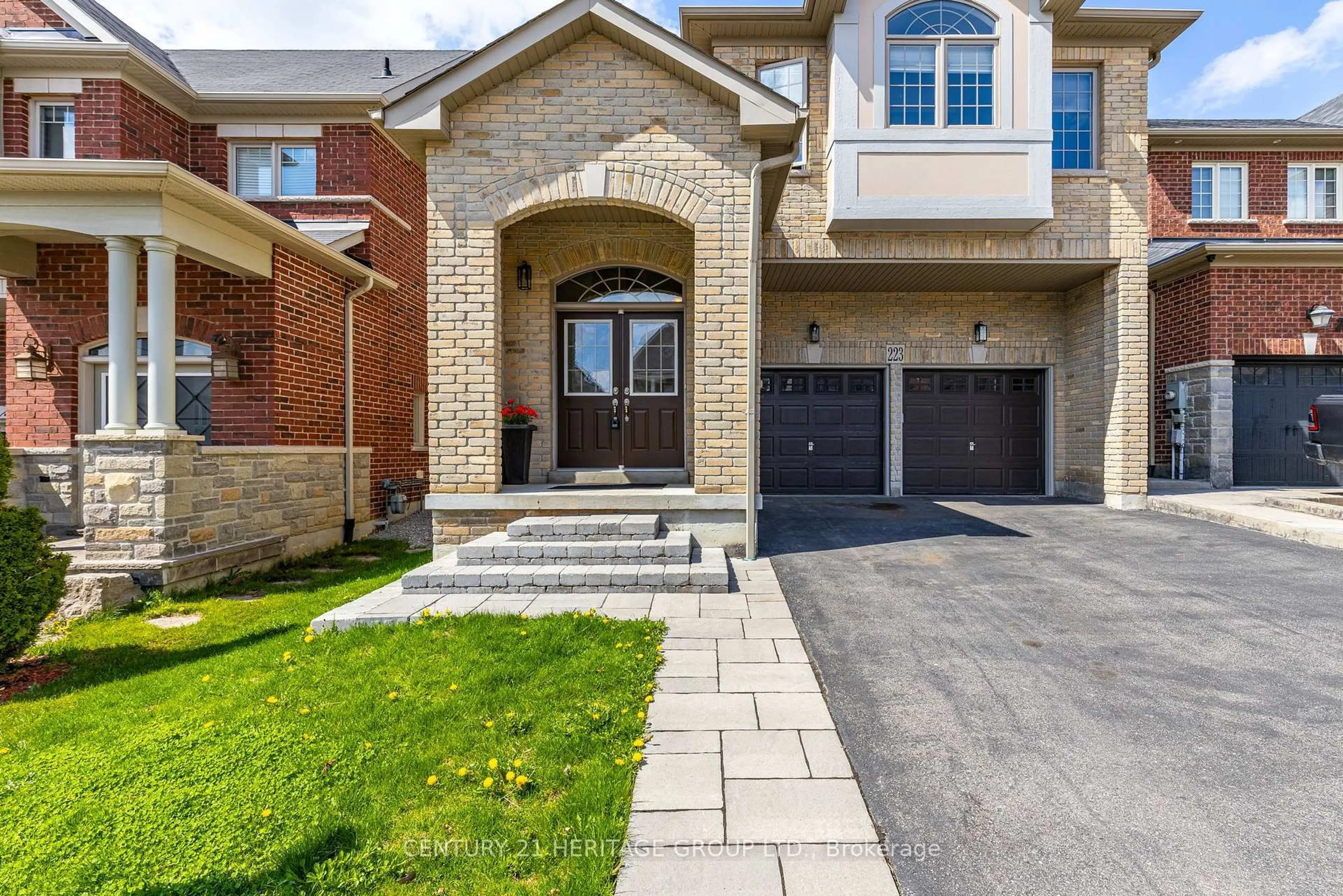 Home with brick exterior material, street for 223 Aspenwod Dr, Newmarket Ontario L3X 3L1