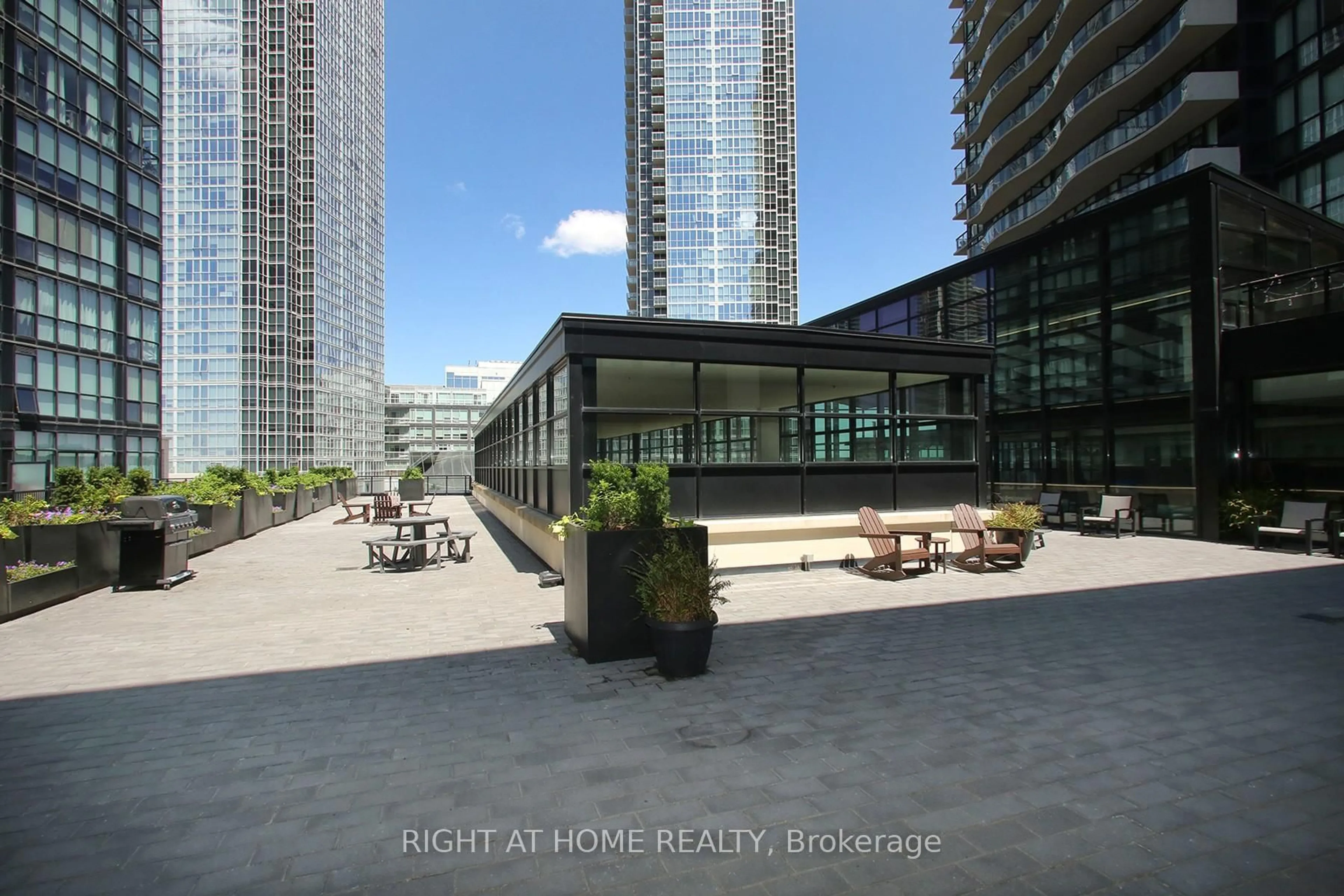 Patio, city buildings view from balcony for 2910 Highway No, 7 Rd #312, Vaughan Ontario L4K 0H8