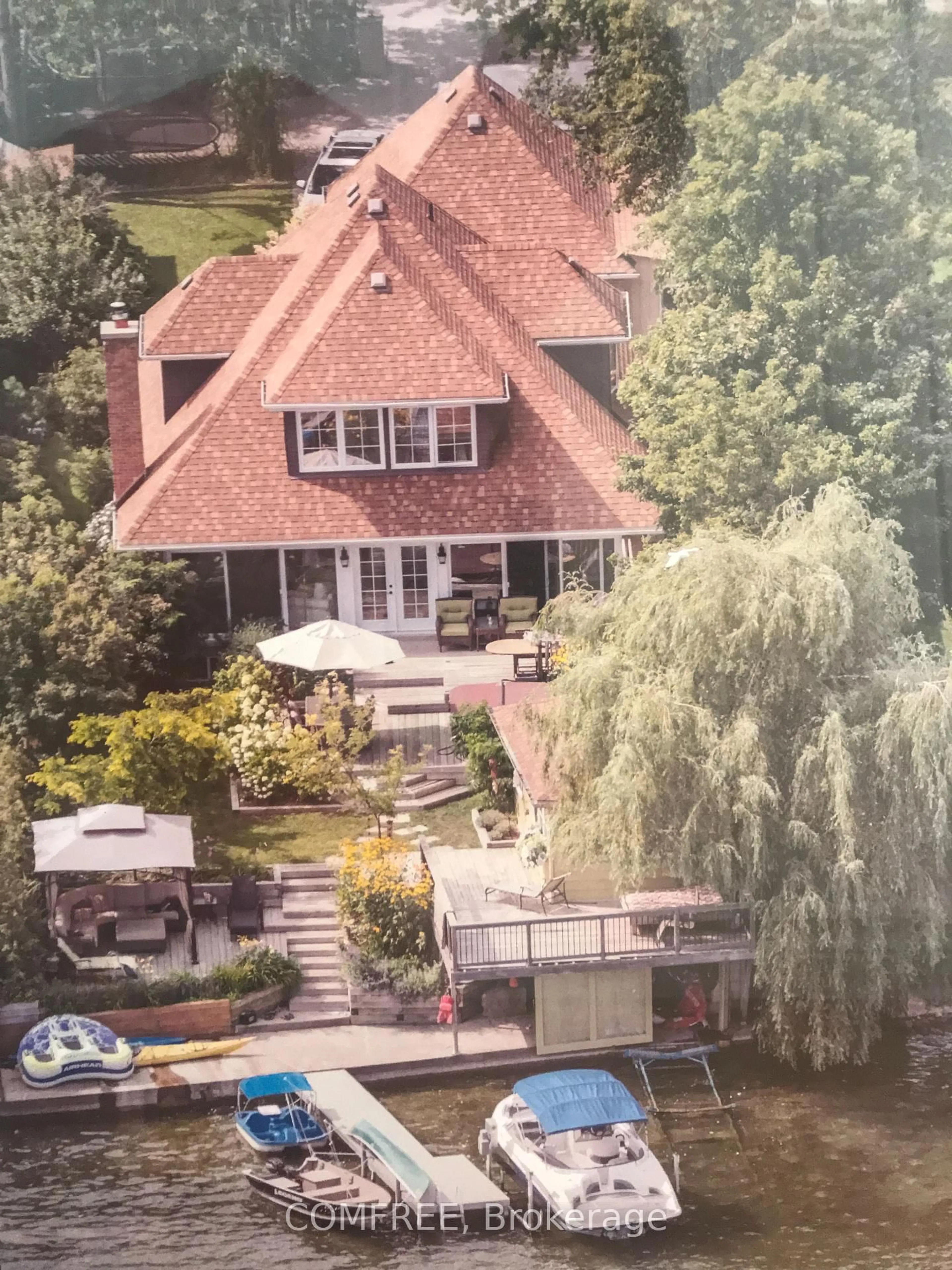 A pic from outside/outdoor area/front of a property/back of a property/a pic from drone, water/lake/river/ocean view for 865 Adams Rd, Innisfil Ontario L9S 4C9