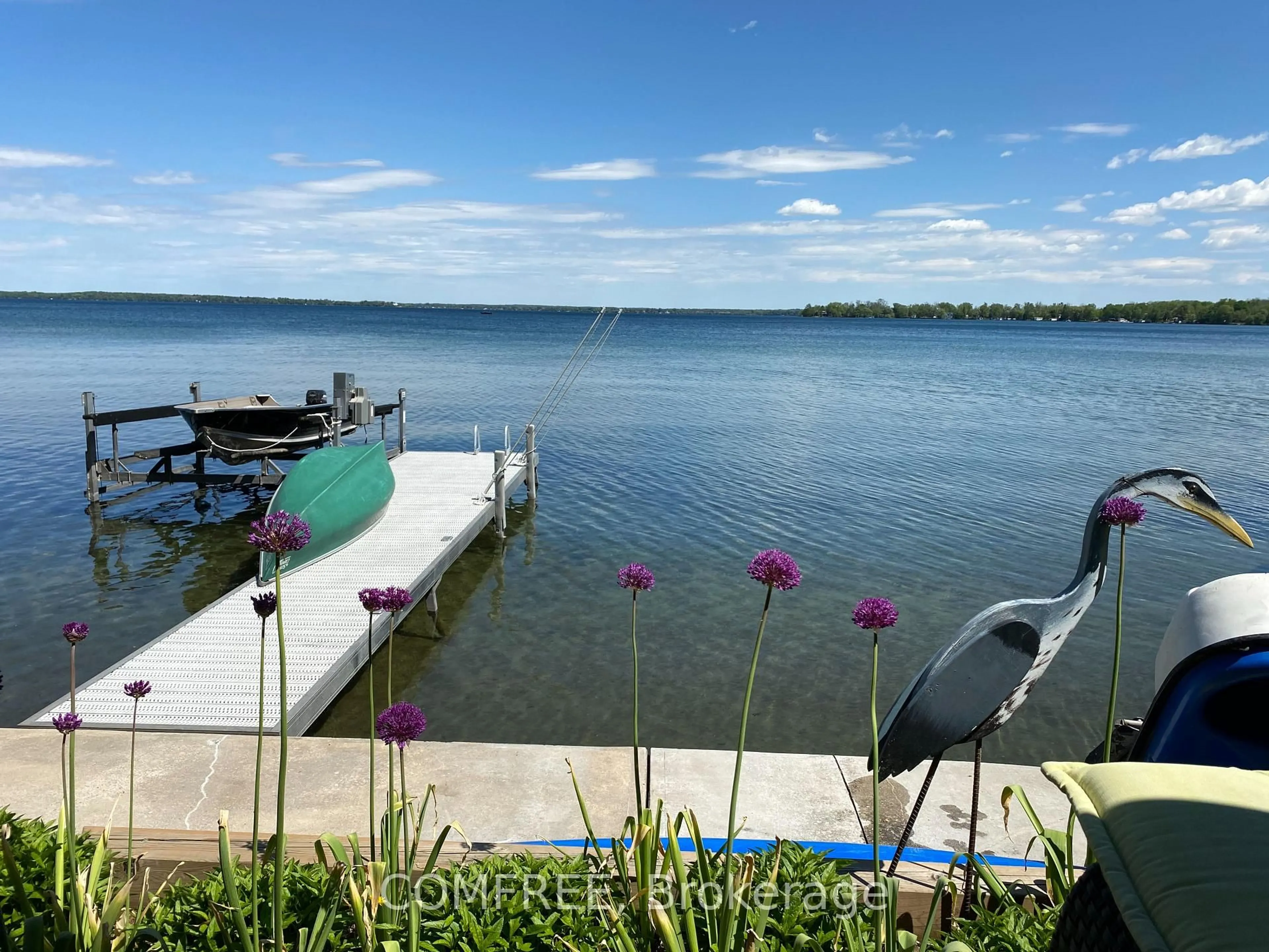 A pic from outside/outdoor area/front of a property/back of a property/a pic from drone, water/lake/river/ocean view for 865 Adams Rd, Innisfil Ontario L9S 4C9