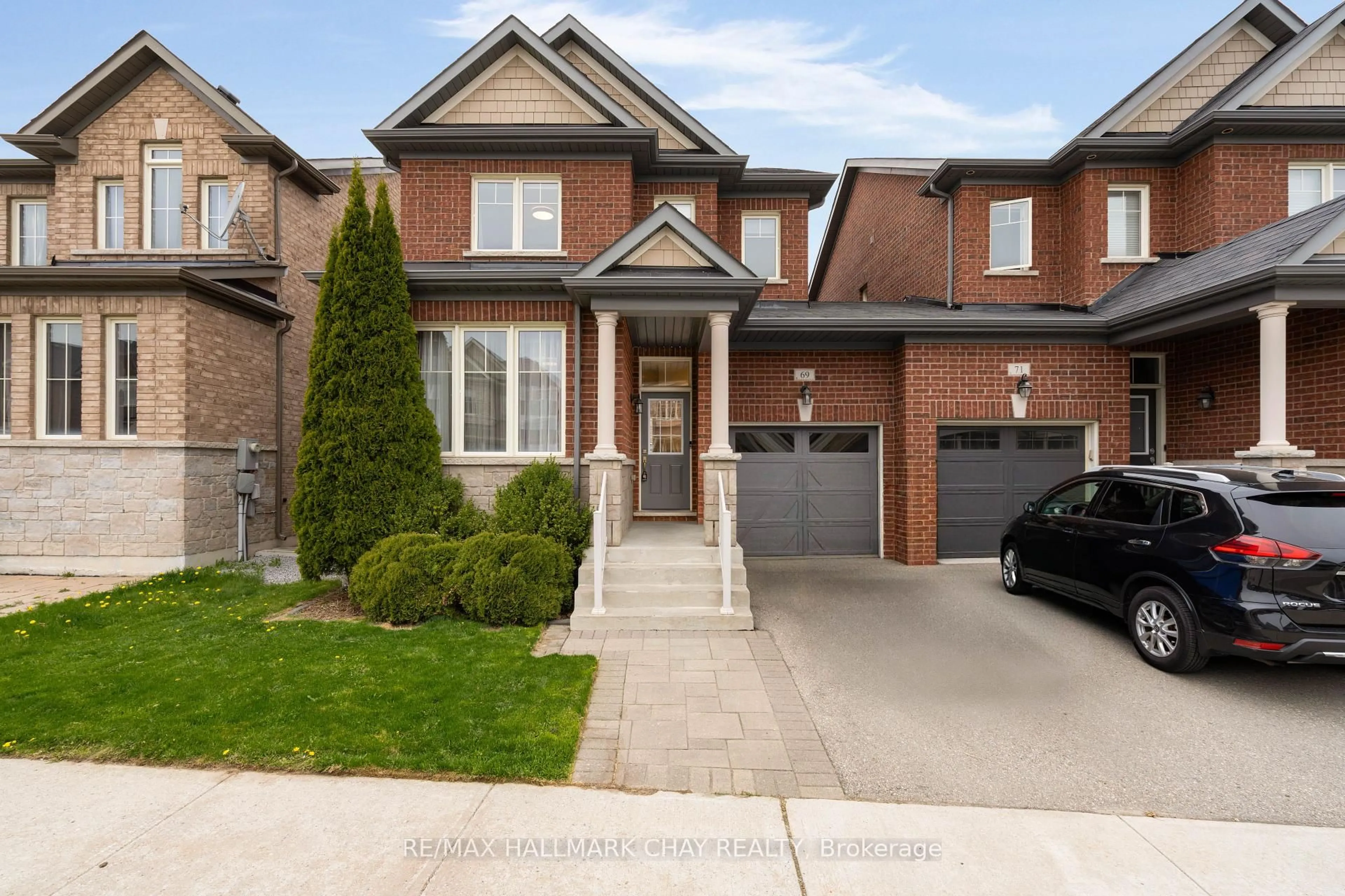 Home with brick exterior material, street for 69 pavlova Cres, Richmond Hill Ontario L4E 0V8