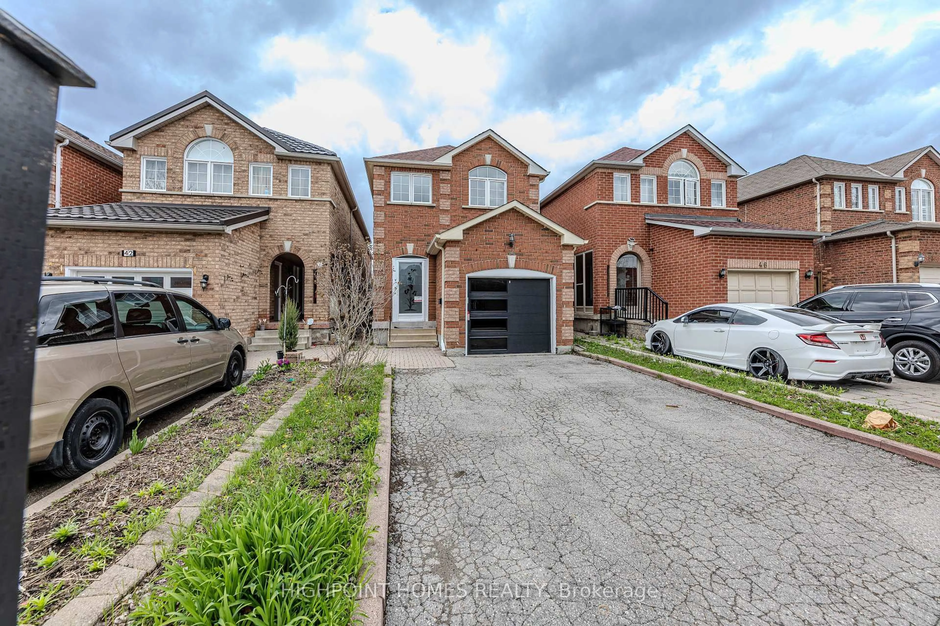 Home with brick exterior material, street for 44 Brando Ave, Markham Ontario L3S 4K9