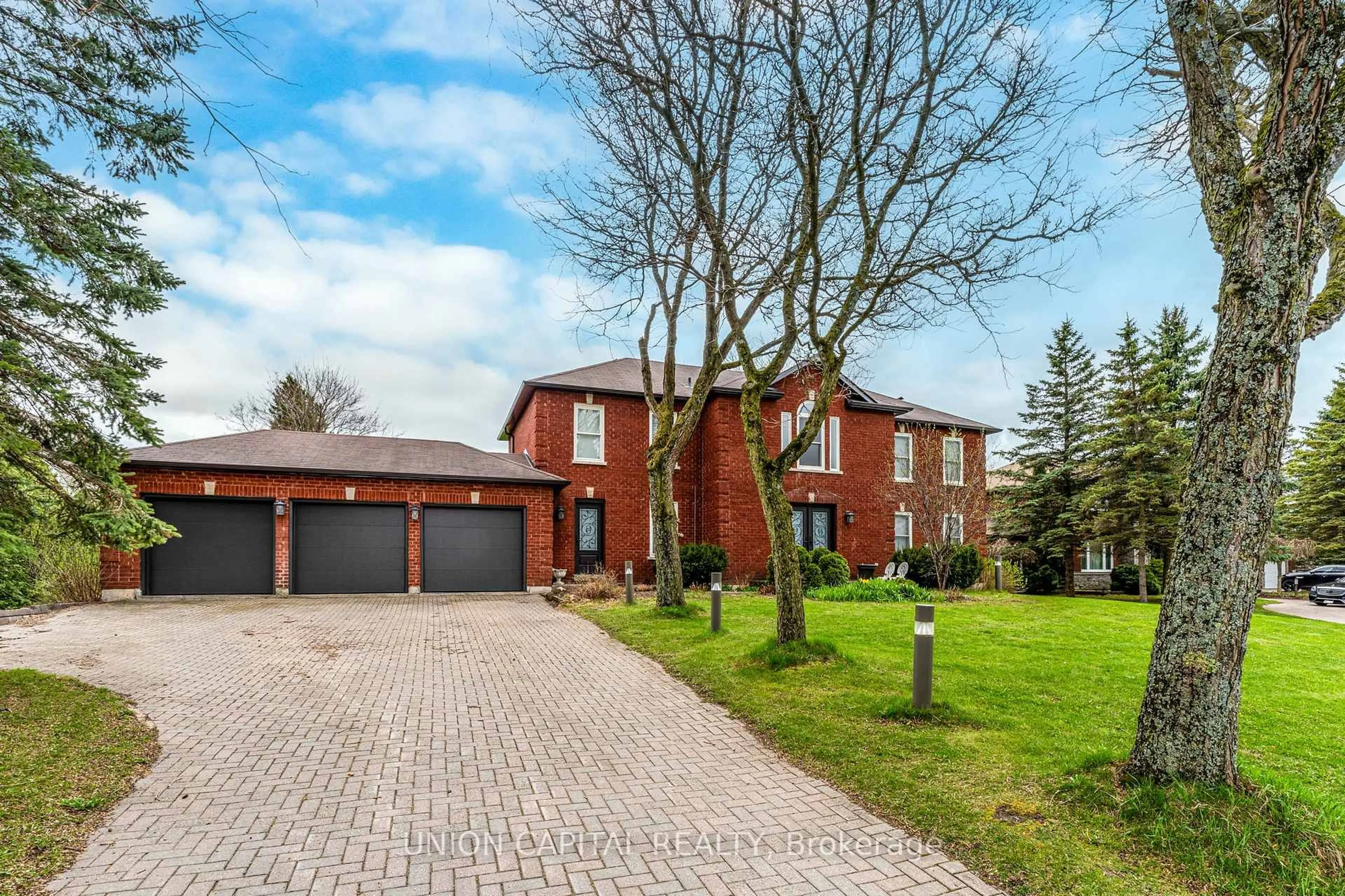 Home with brick exterior material, street for 12 Reesor Pl, Whitchurch-Stouffville Ontario L4A 2C6