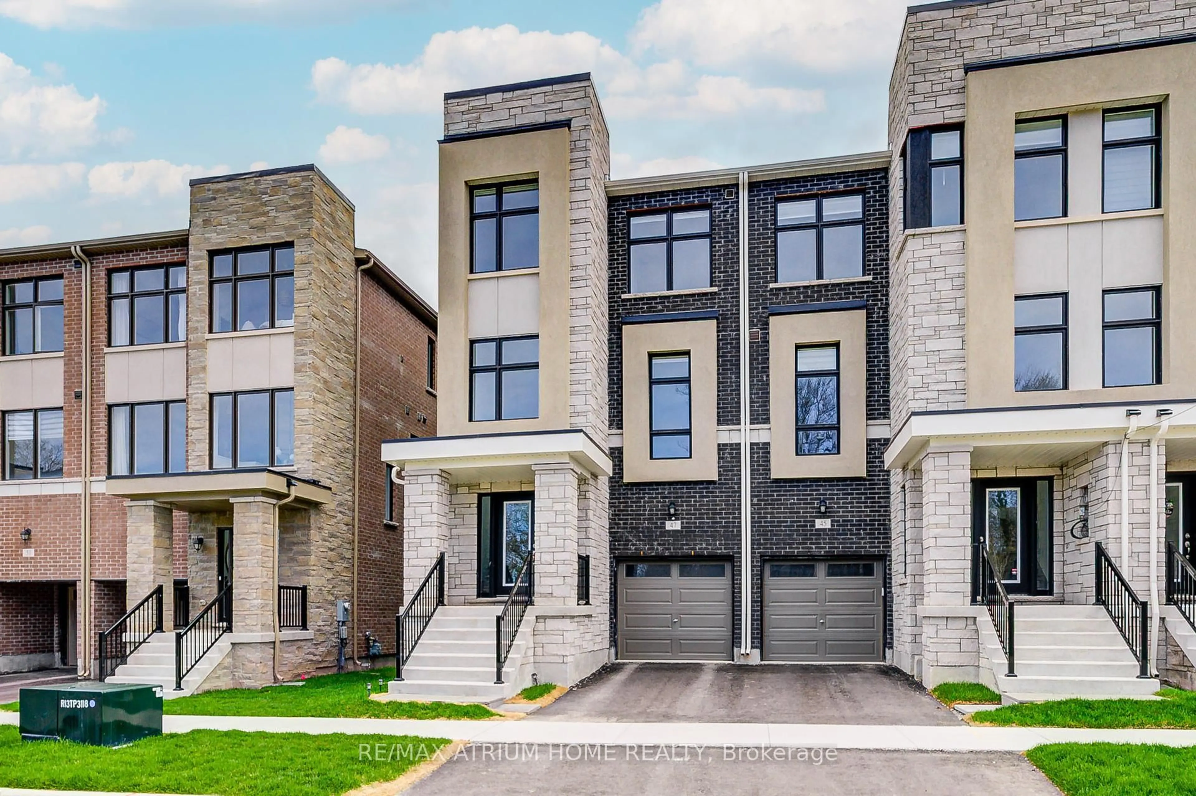 Home with brick exterior material, street for 47 Puisaya Dr, Richmond Hill Ontario L4E 1L2