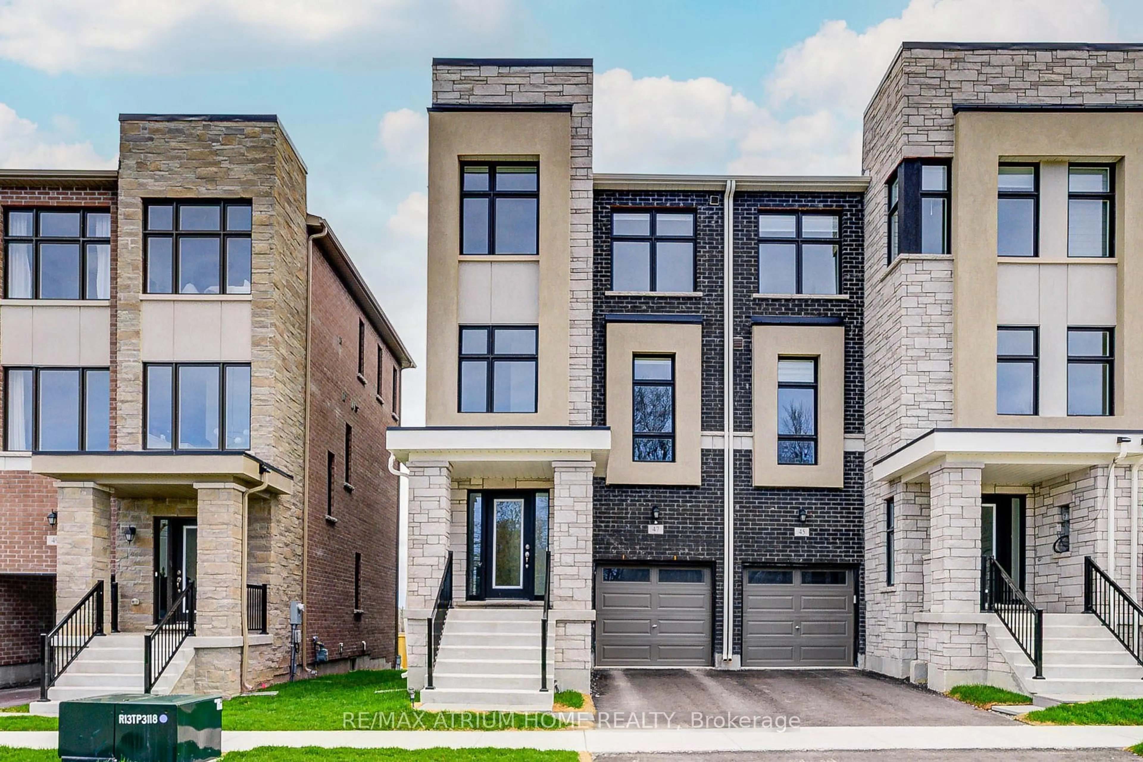 Home with brick exterior material, street for 47 Puisaya Dr, Richmond Hill Ontario L4E 1L2