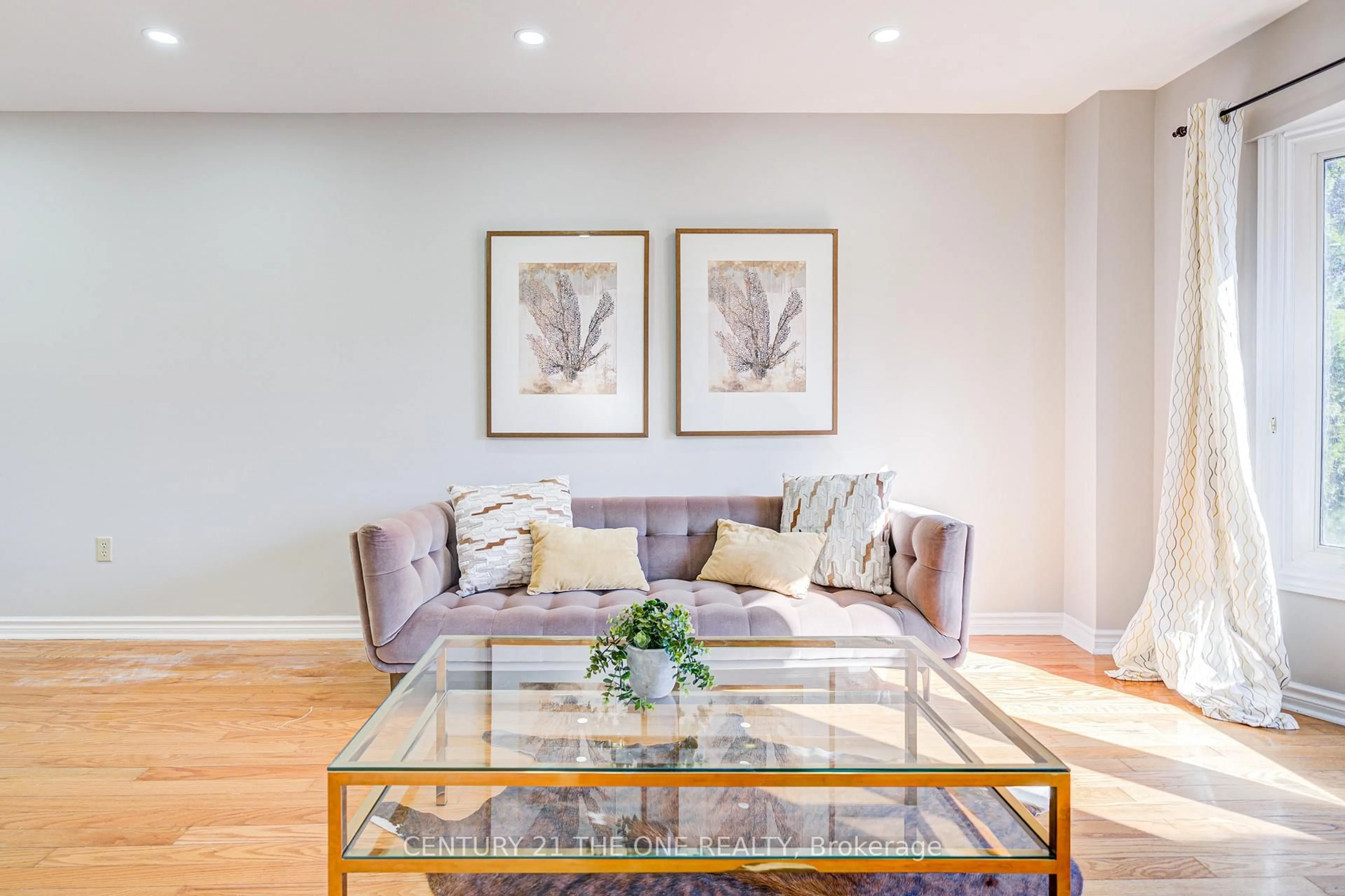 Living room with furniture, wood/laminate floor for 12 Featherstone Ave, Markham Ontario L3S 2E5