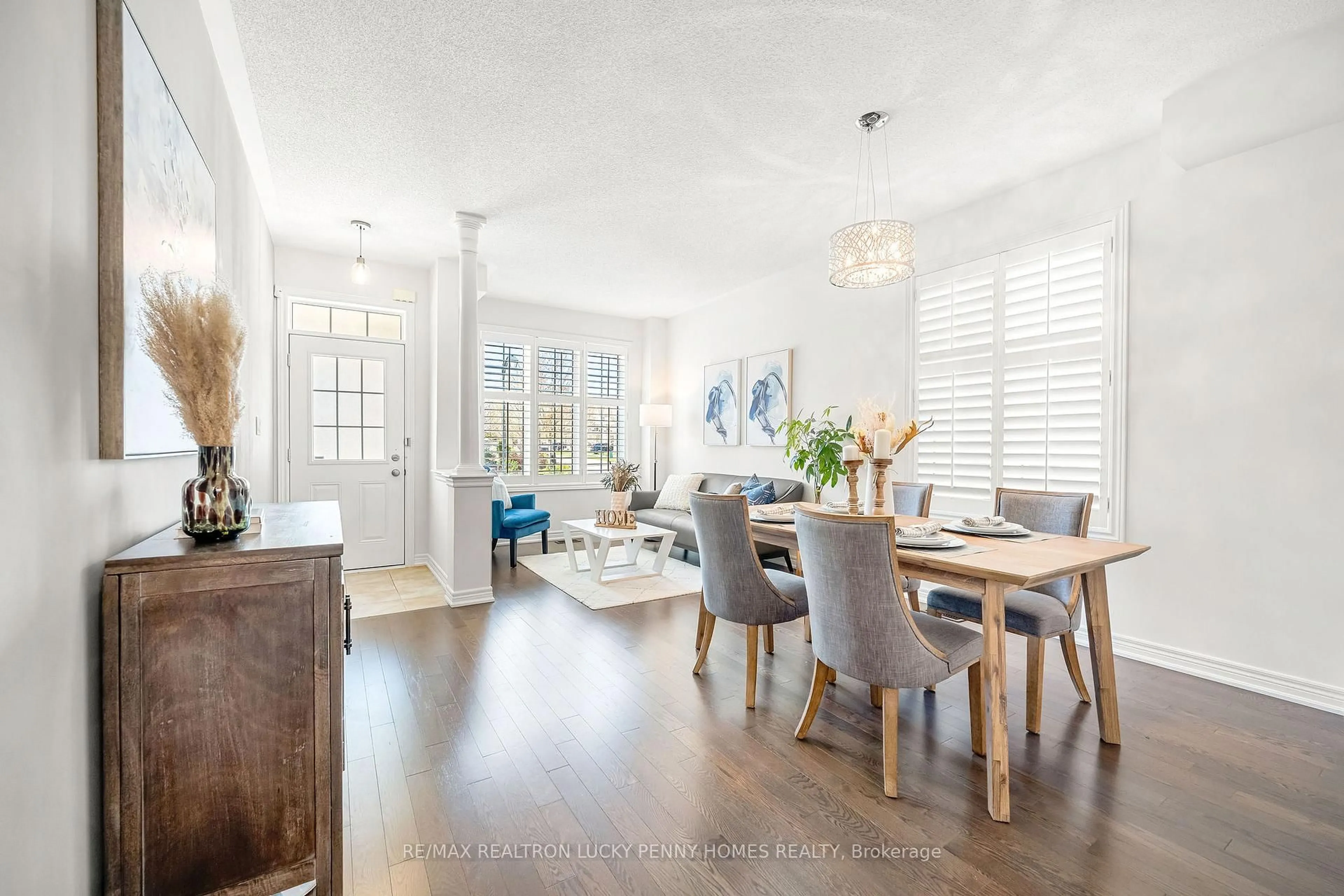 Dining room, wood/laminate floor for 19 Wermoth Crt, Markham Ontario L6E 0S6