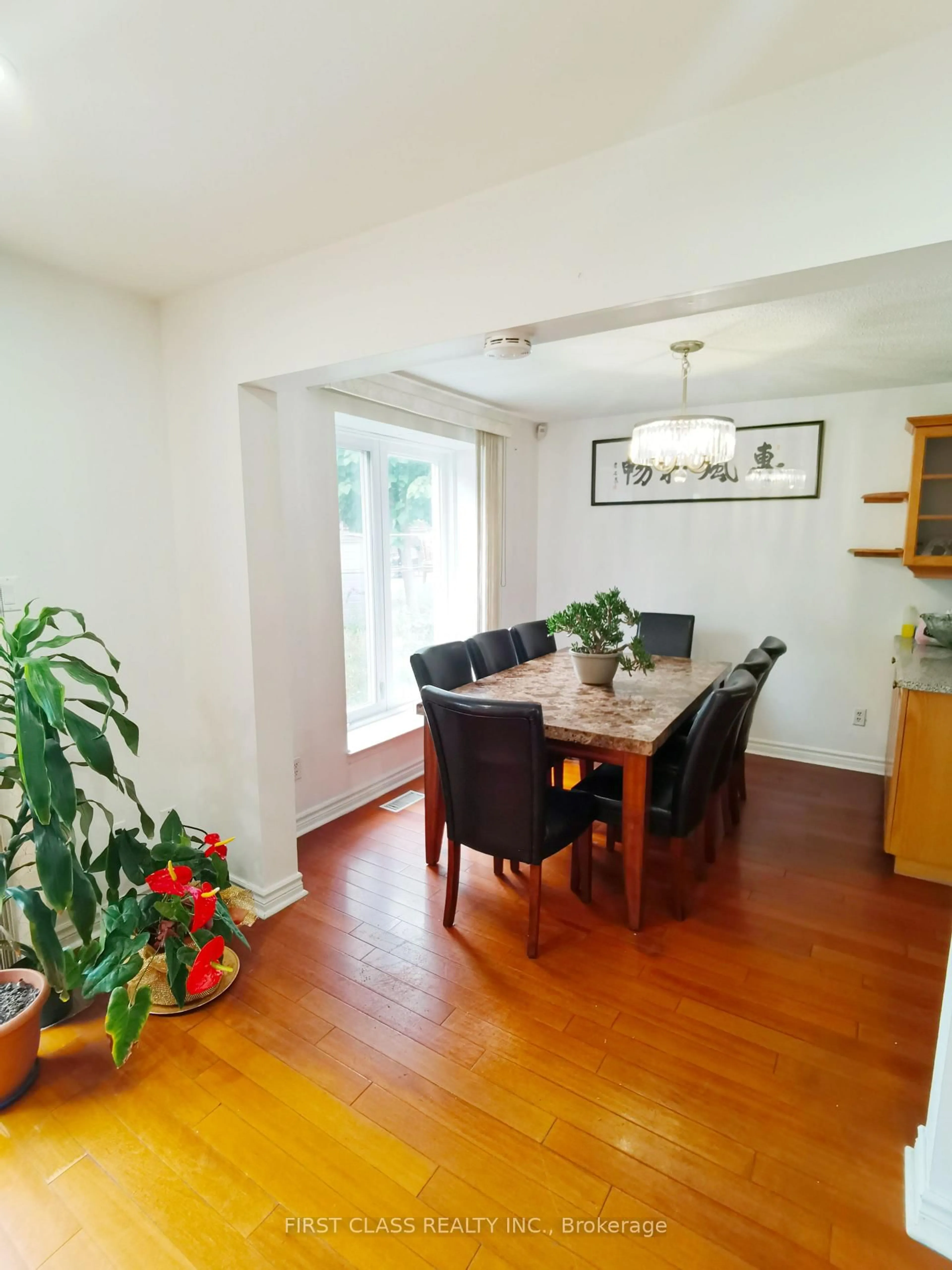 Dining room, wood/laminate floor for 23 Cheeseman Dr, Markham Ontario L3R 3G3