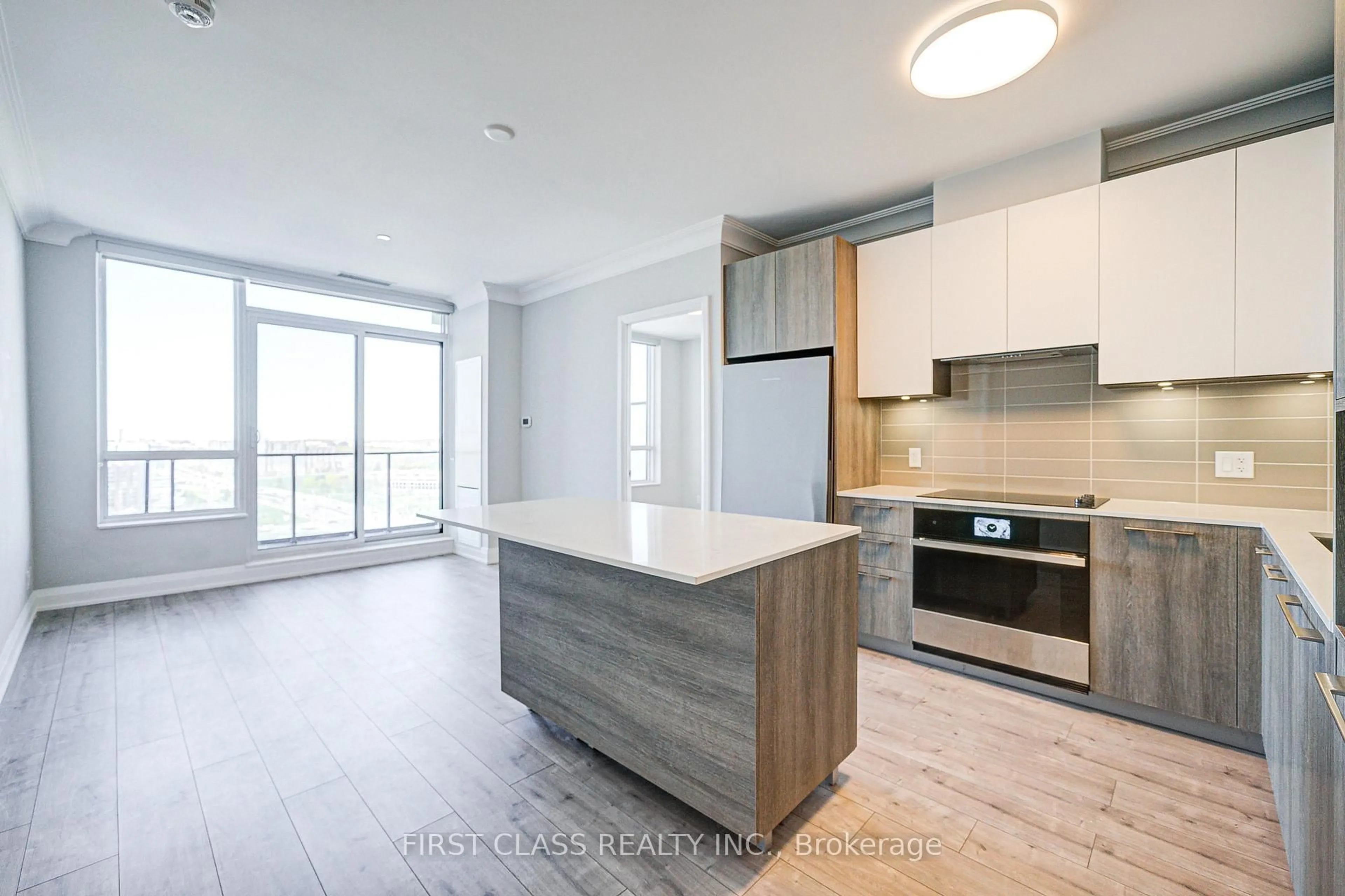 Open concept kitchen, wood/laminate floor for 18 Water Walk Dr #2206, Markham Ontario L3R 6L5
