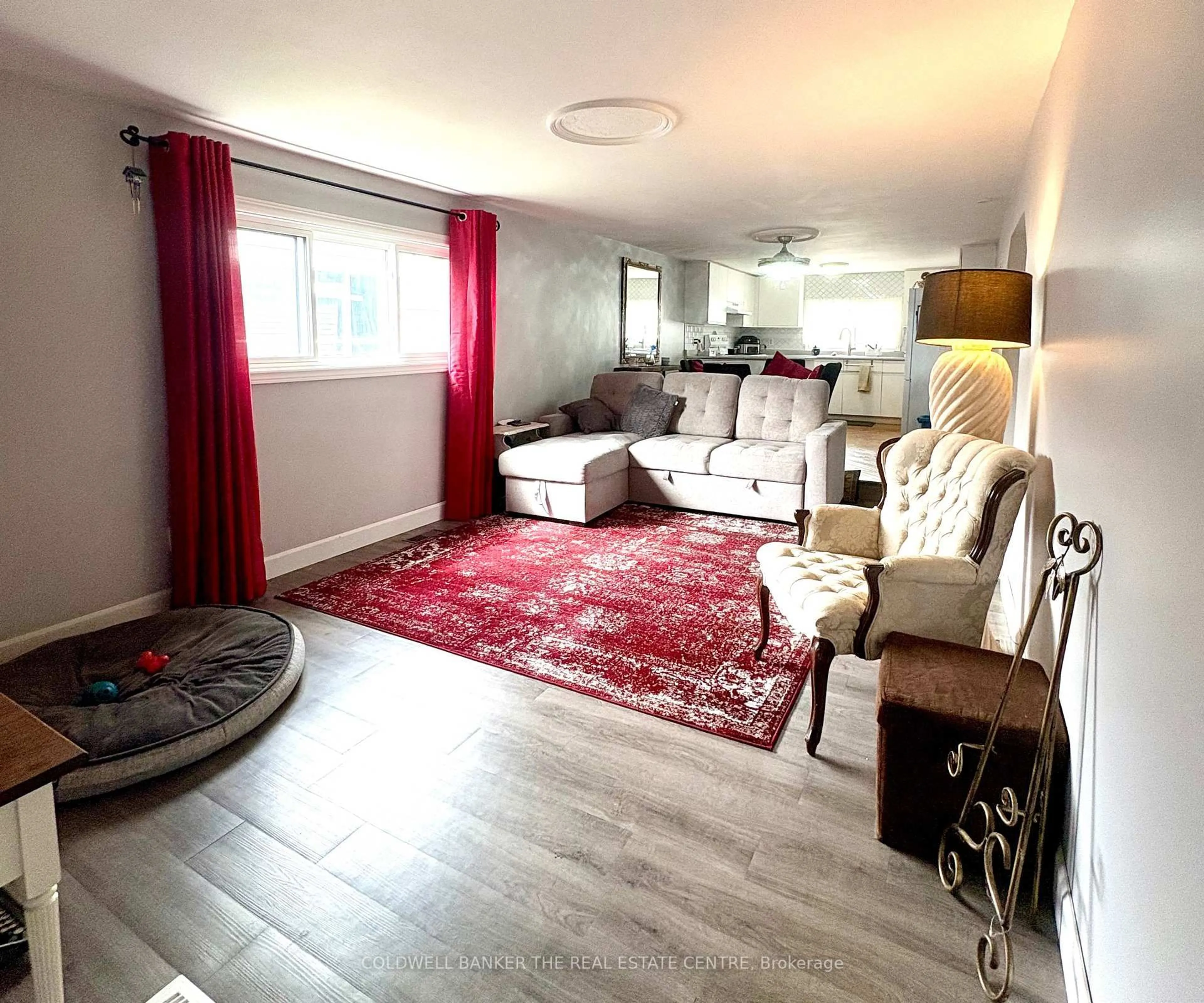 Living room with furniture, unknown for 82 Seventh St, Essa Ontario L3W 0L4