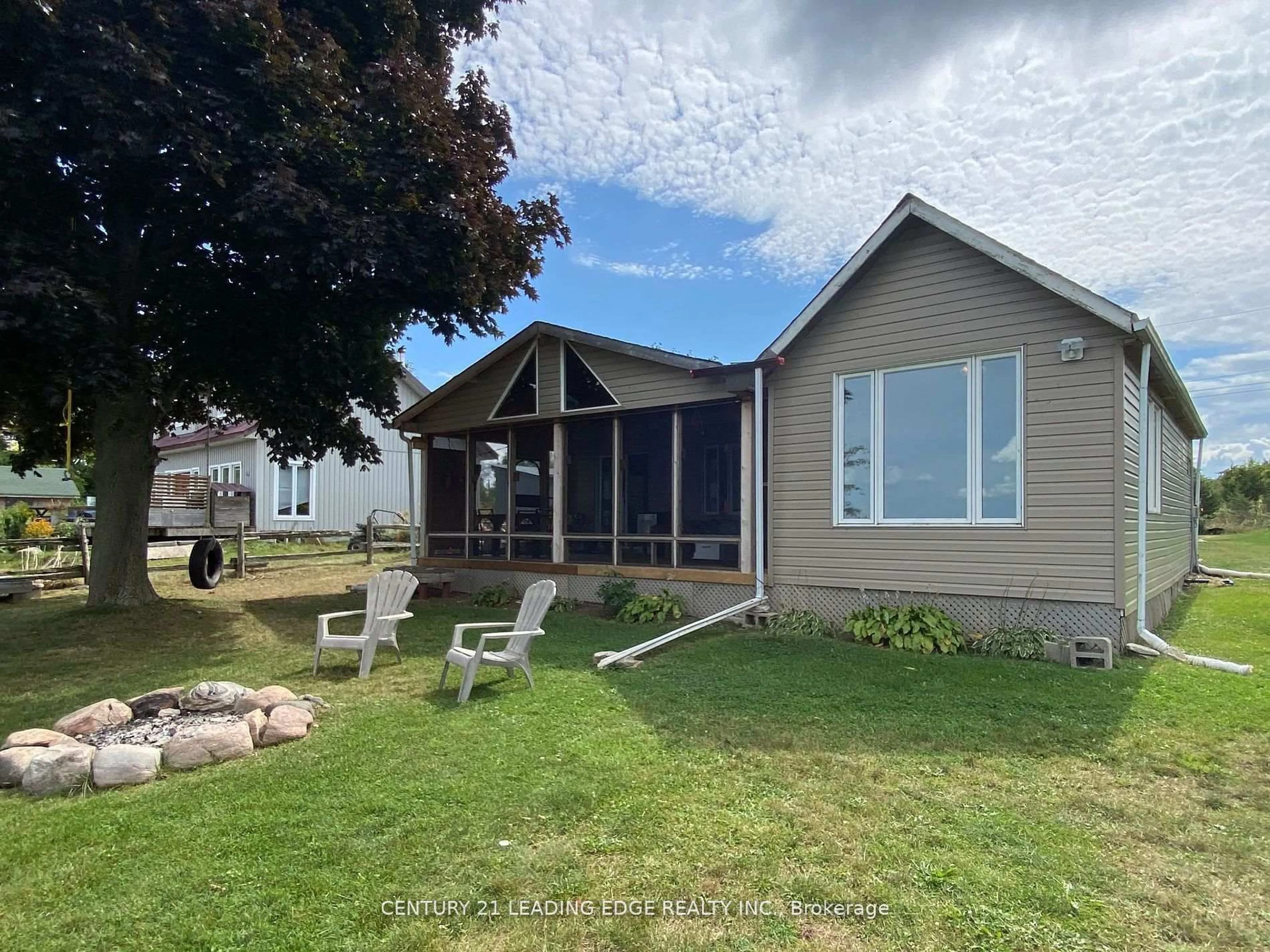 A pic from outside/outdoor area/front of a property/back of a property/a pic from drone, water/lake/river/ocean view for 40586B Shore Rd, Brock Ontario L0K 1A0