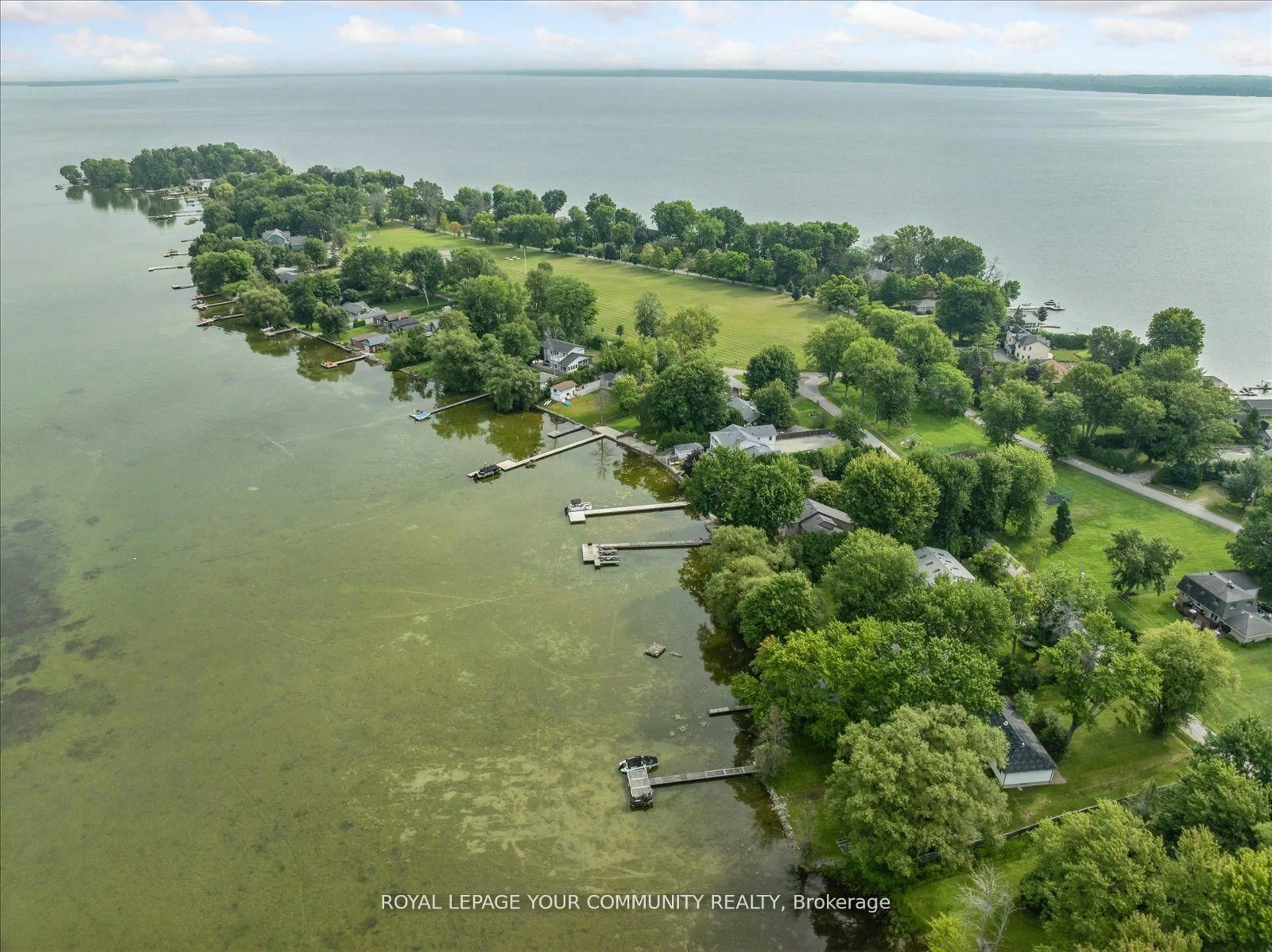 A pic from outside/outdoor area/front of a property/back of a property/a pic from drone, water/lake/river/ocean view for 580 Duclos Point Rd, Georgina Ontario L0E 1N0