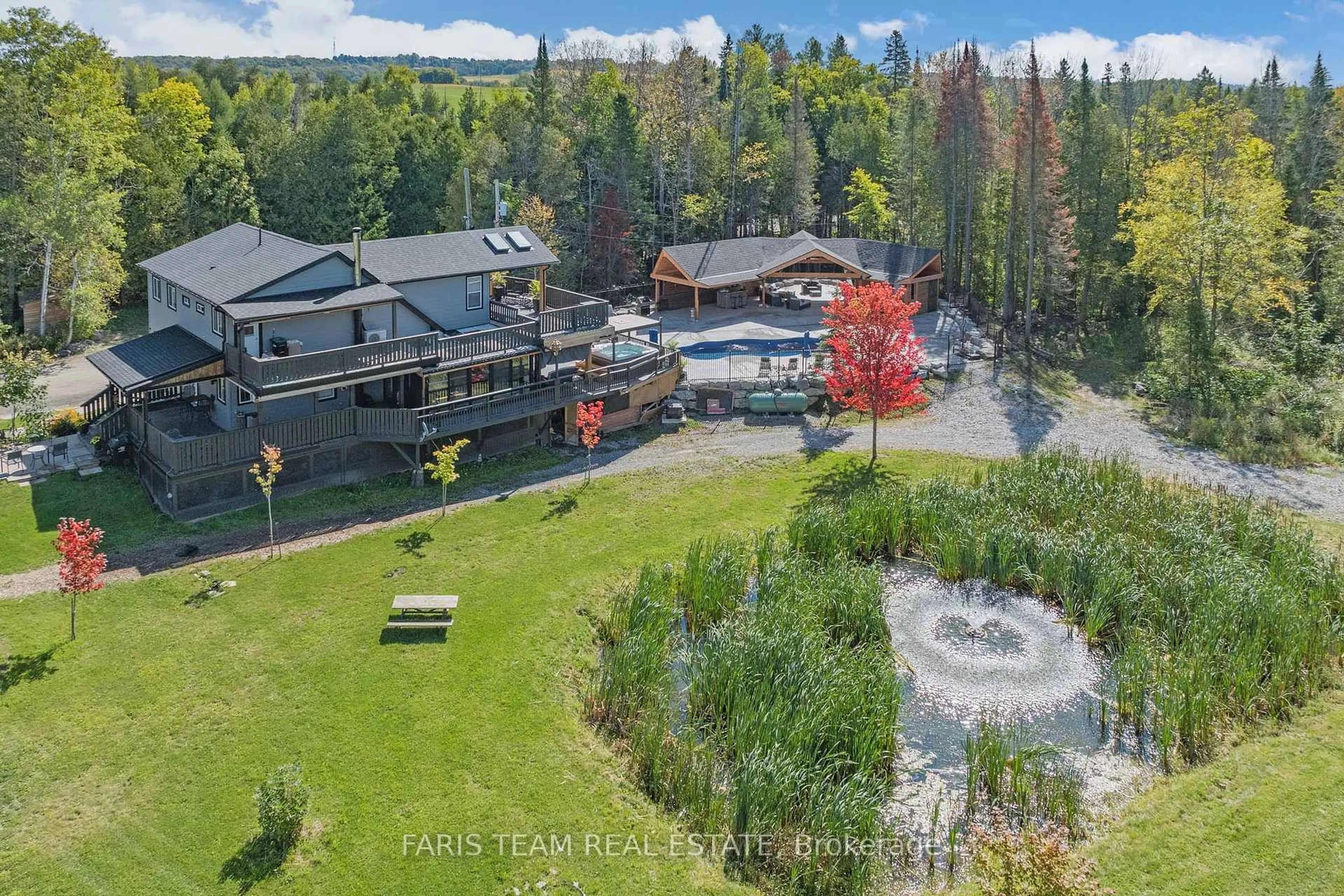 A pic from outside/outdoor area/front of a property/back of a property/a pic from drone, unknown for 2642 5th Line, Innisfil Ontario L0L 1K0