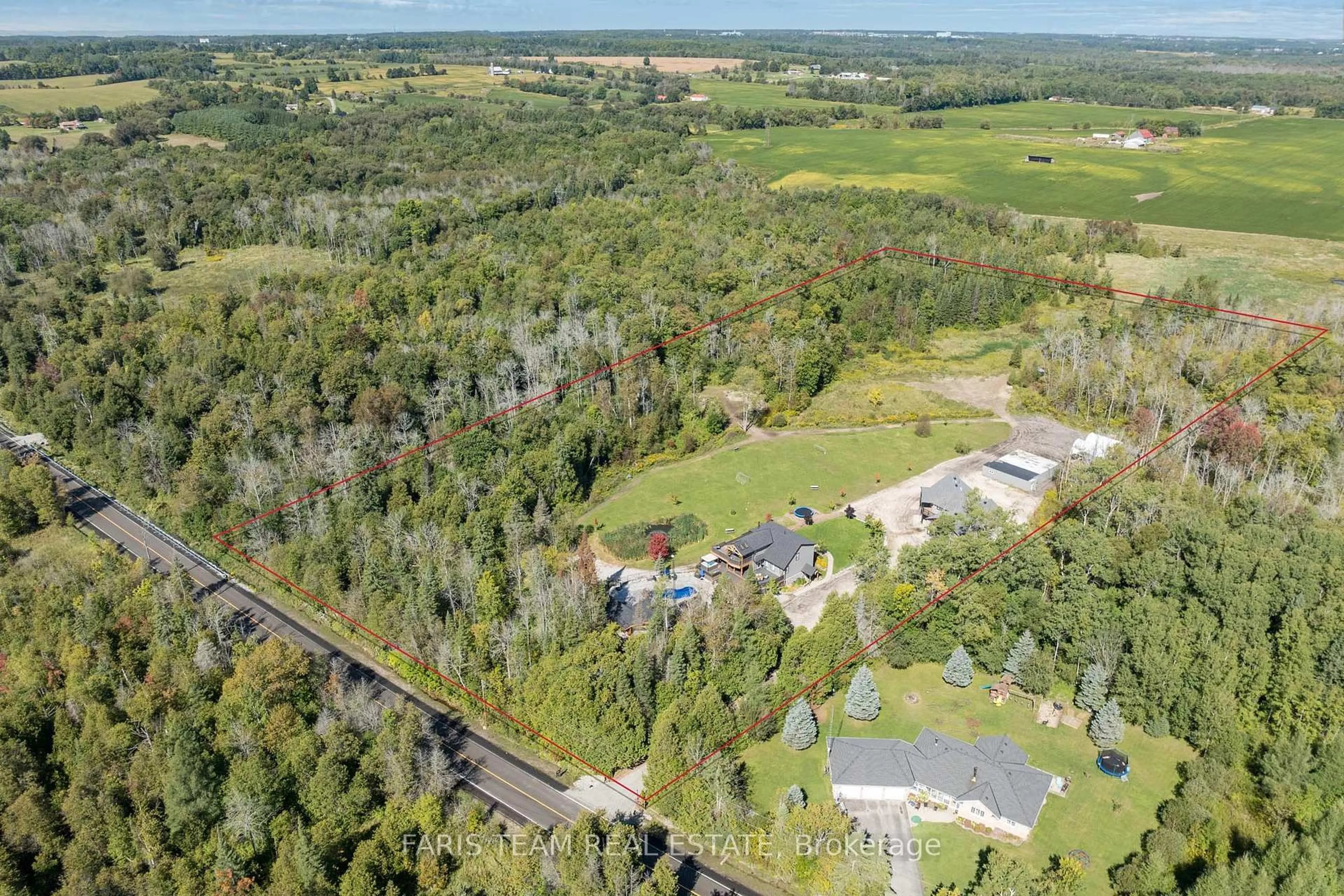 A pic from outside/outdoor area/front of a property/back of a property/a pic from drone, forest/trees view for 2642 5th Line, Innisfil Ontario L0L 1K0