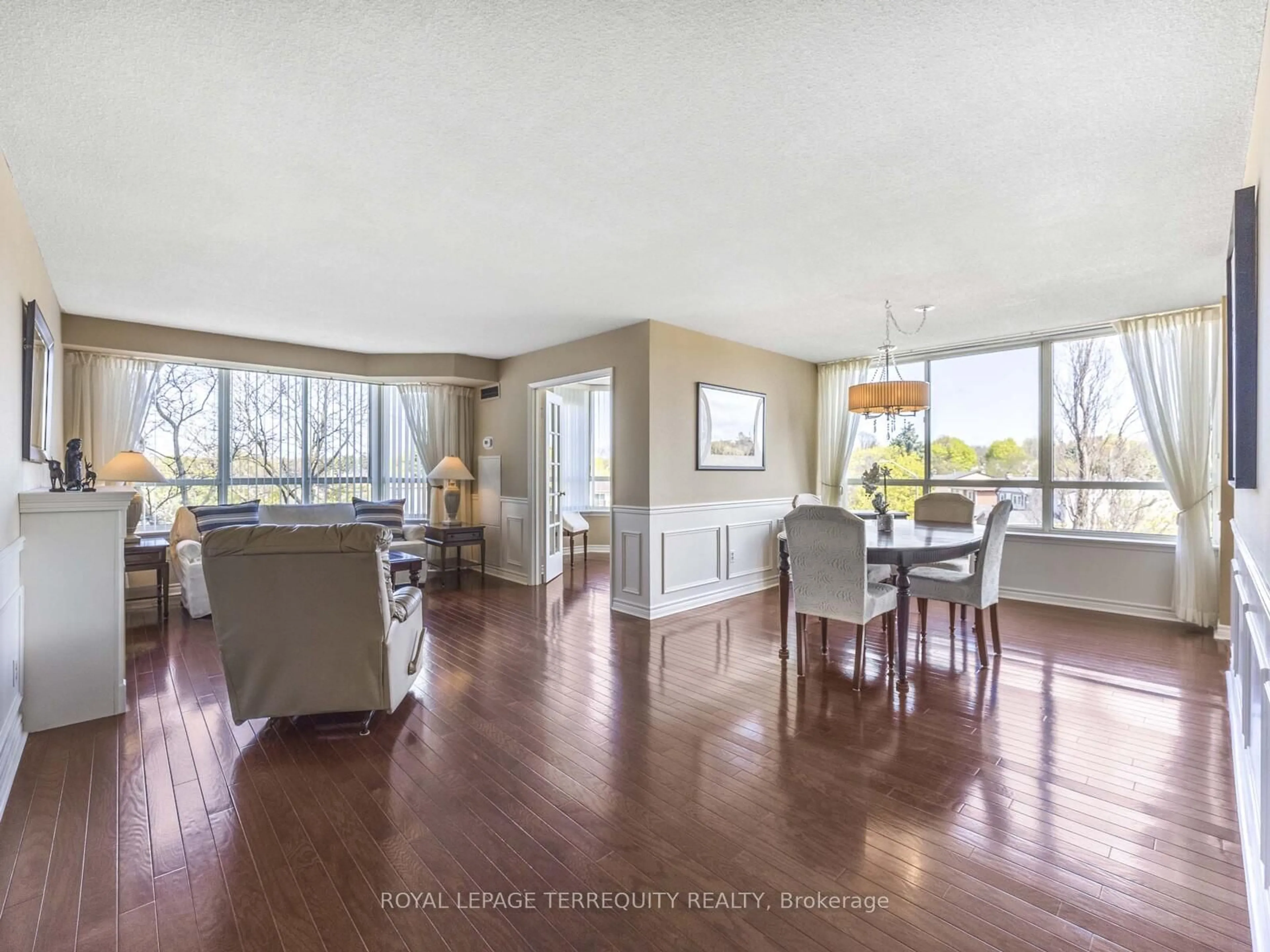 Living room with furniture, wood/laminate floor for 55 Austin Dr #312, Markham Ontario L3R 8H5