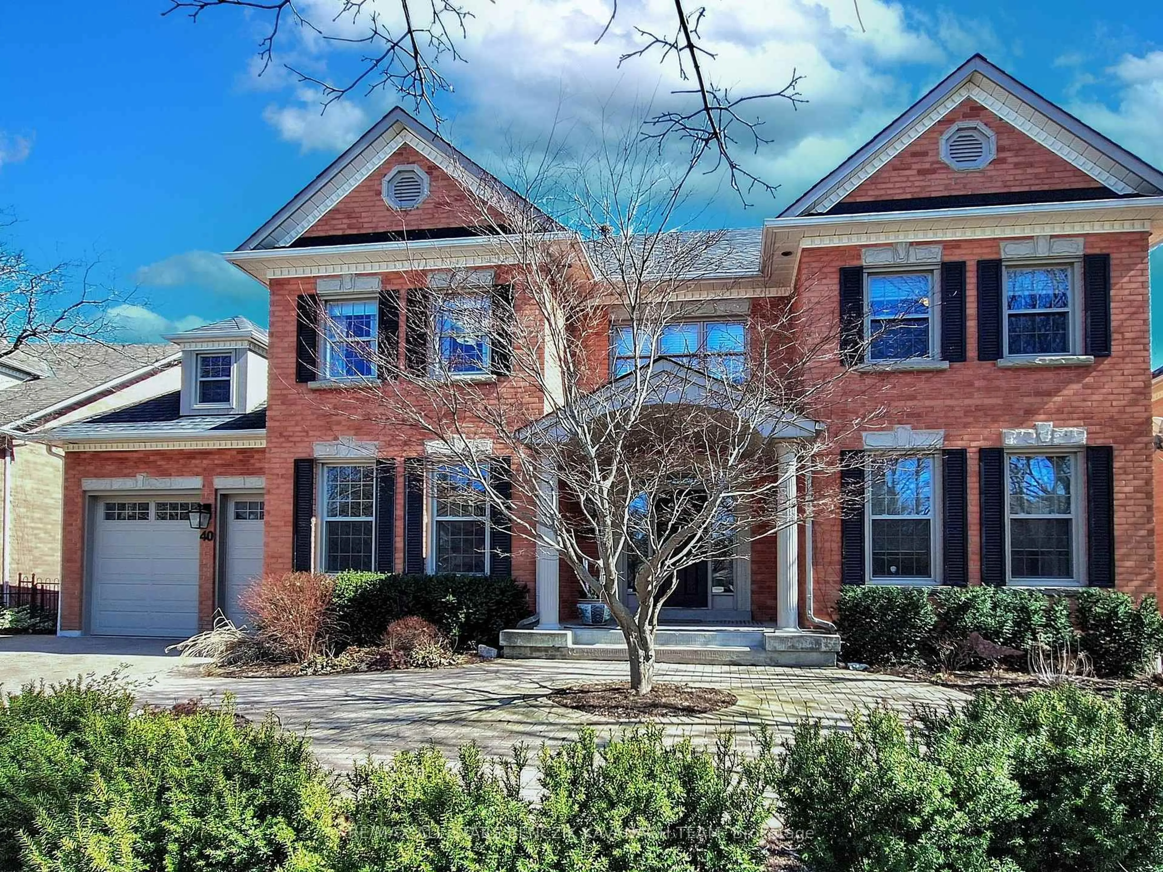 Home with brick exterior material, street for 40 Wrenwood Crt, Markham Ontario L3R 6H4