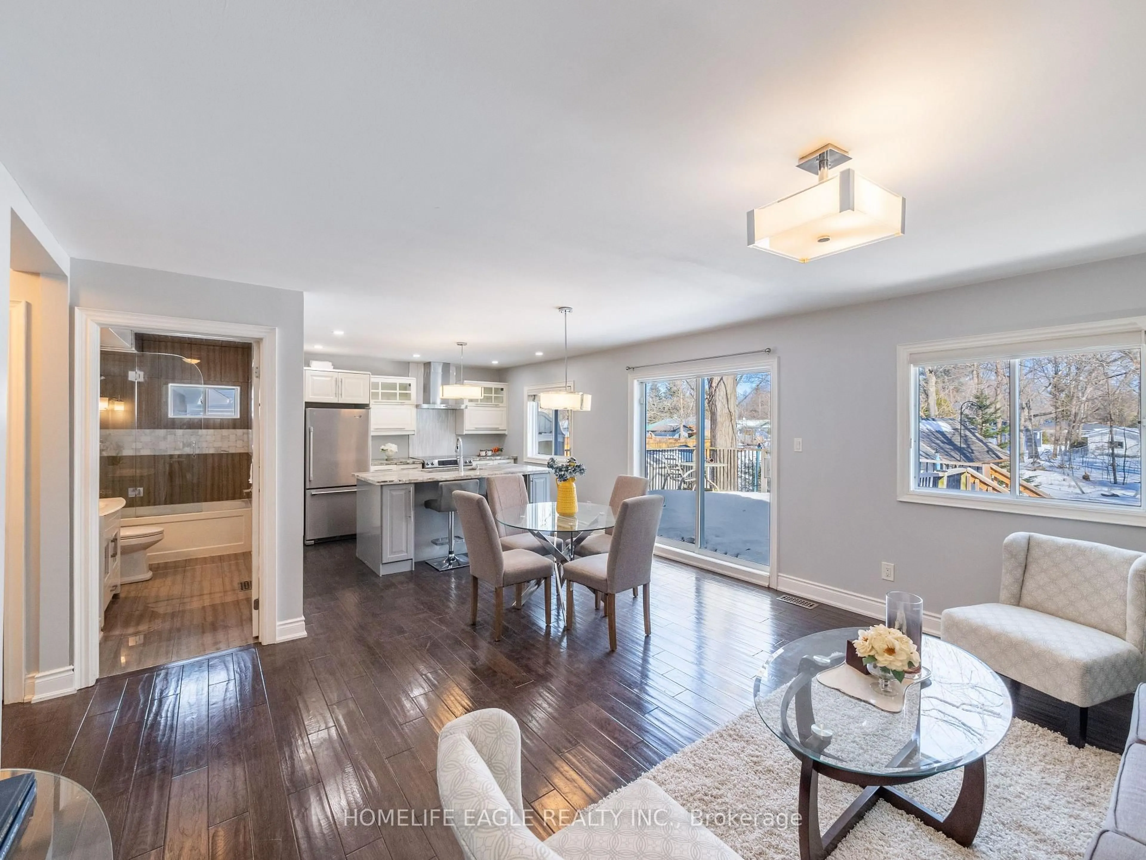 Open concept kitchen, wood/laminate floor for 2049 Kate Ave, Innisfil Ontario L9S 1Y2