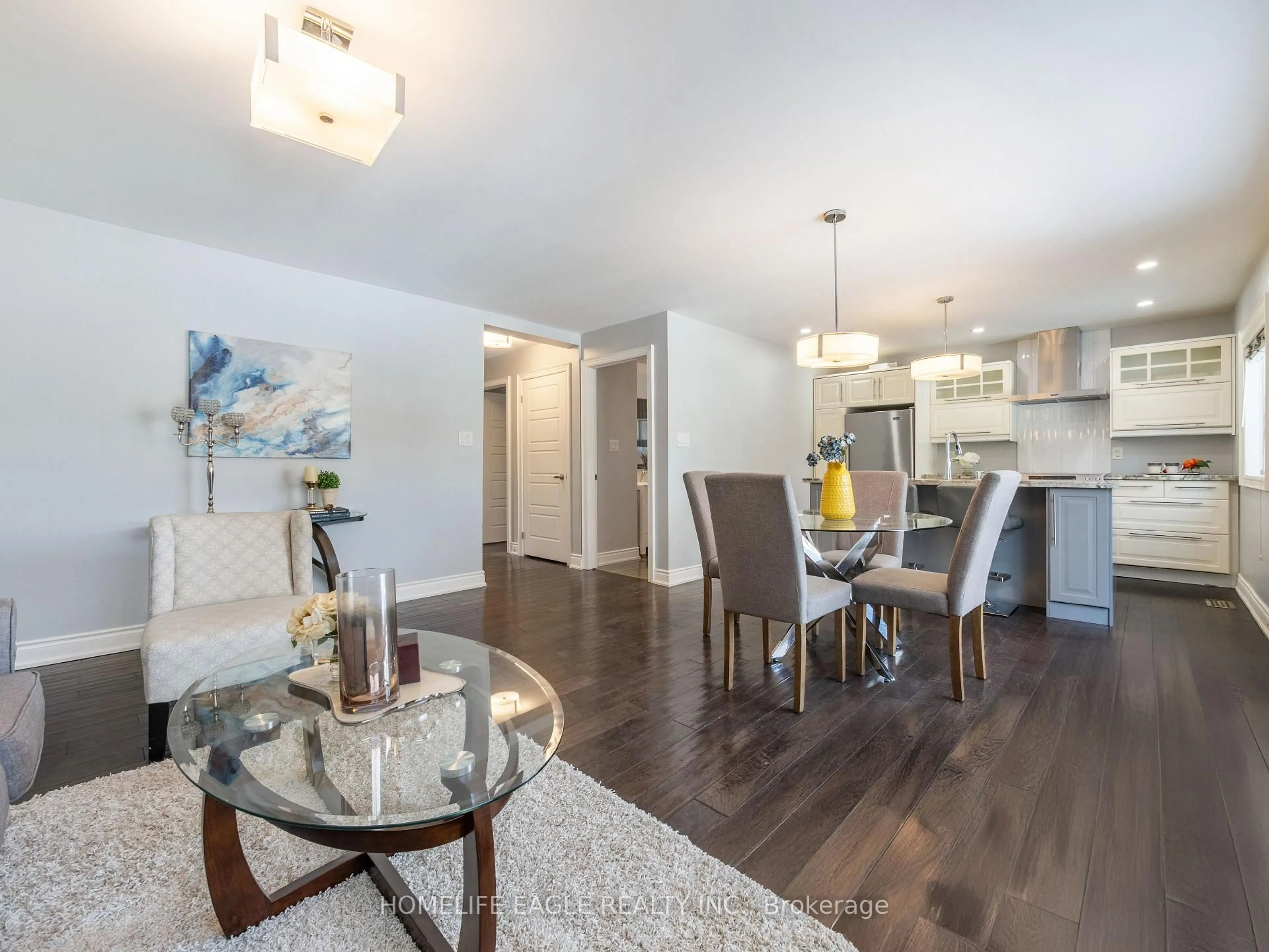 Open concept kitchen, wood/laminate floor for 2049 Kate Ave, Innisfil Ontario L9S 1Y2