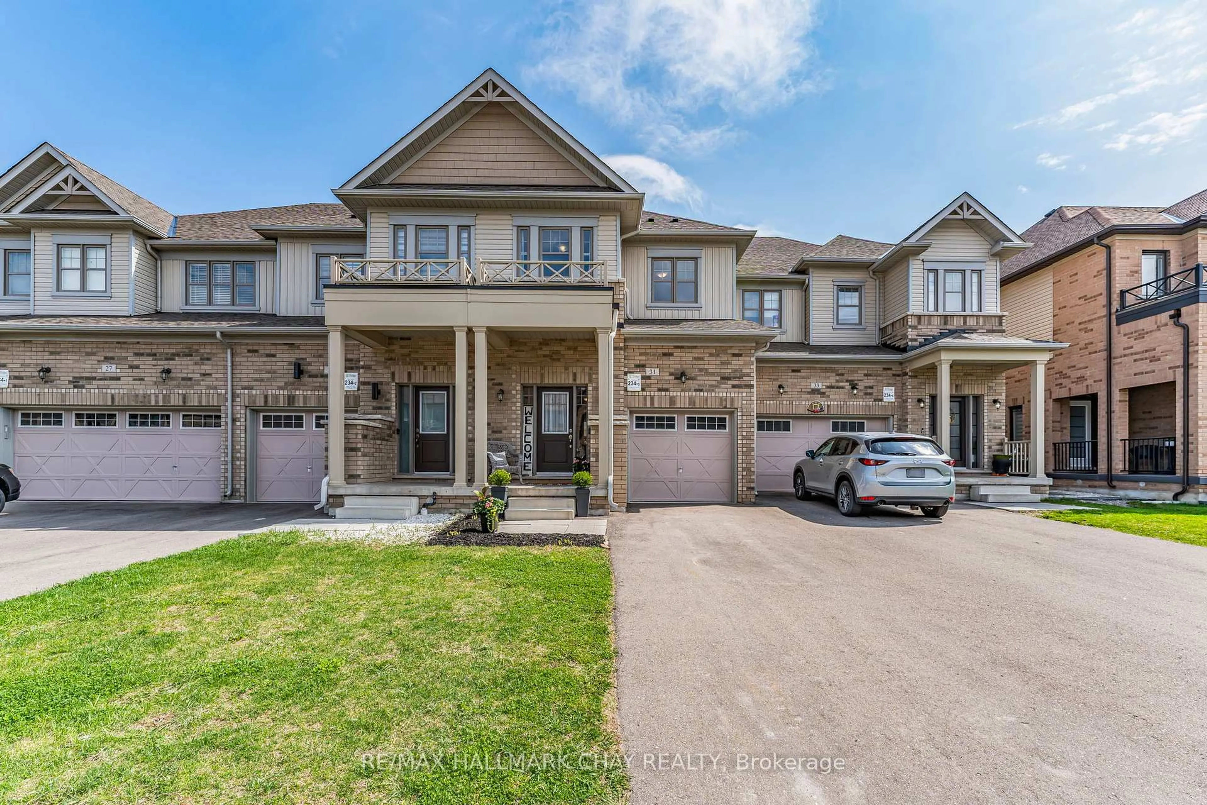 A pic from outside/outdoor area/front of a property/back of a property/a pic from drone, street for 31 Arnold Cres, New Tecumseth Ontario L9R 0T6