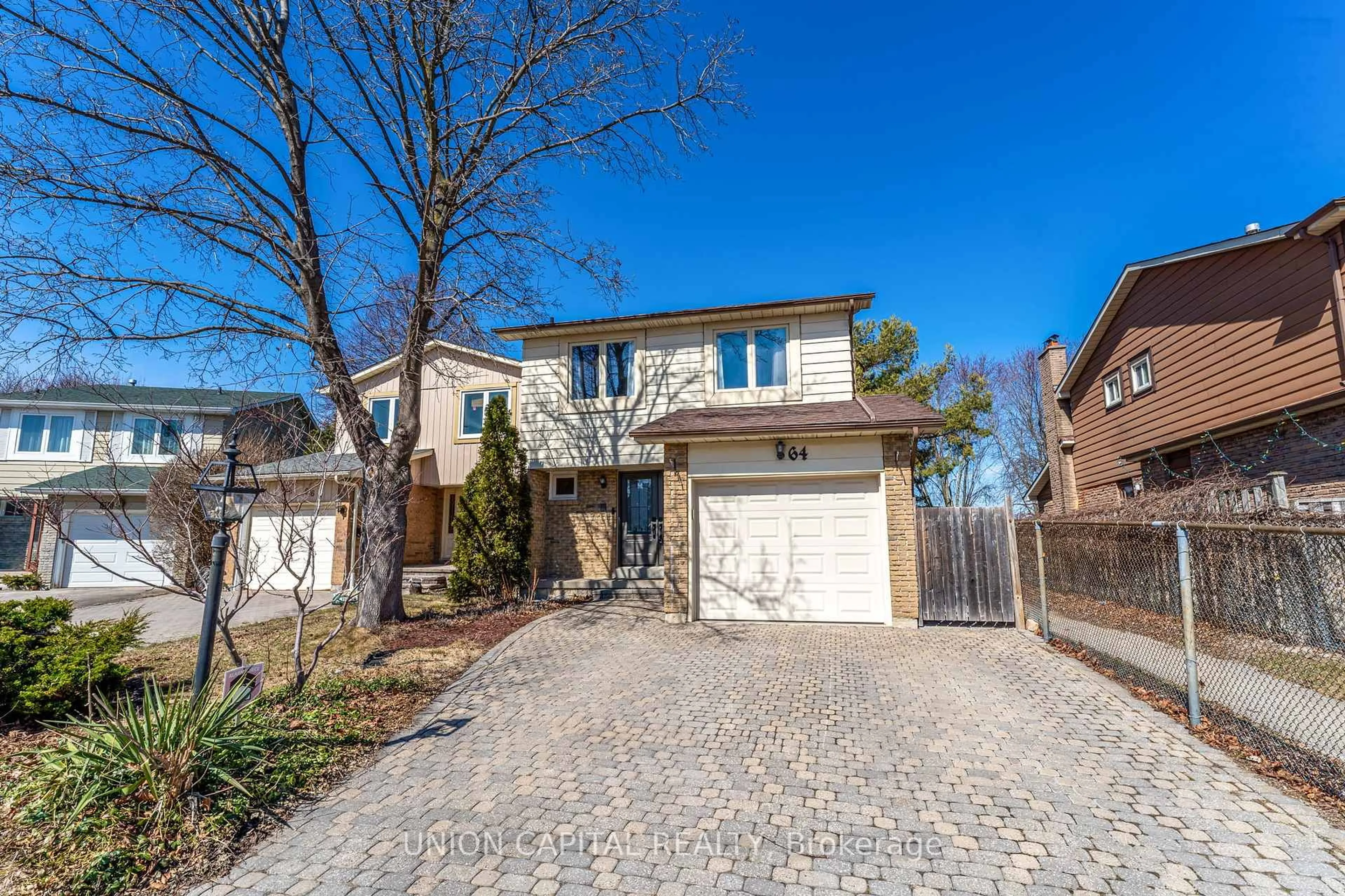 Home with brick exterior material, street for 64 Lilac Ave, Markham Ontario L3T 5K2