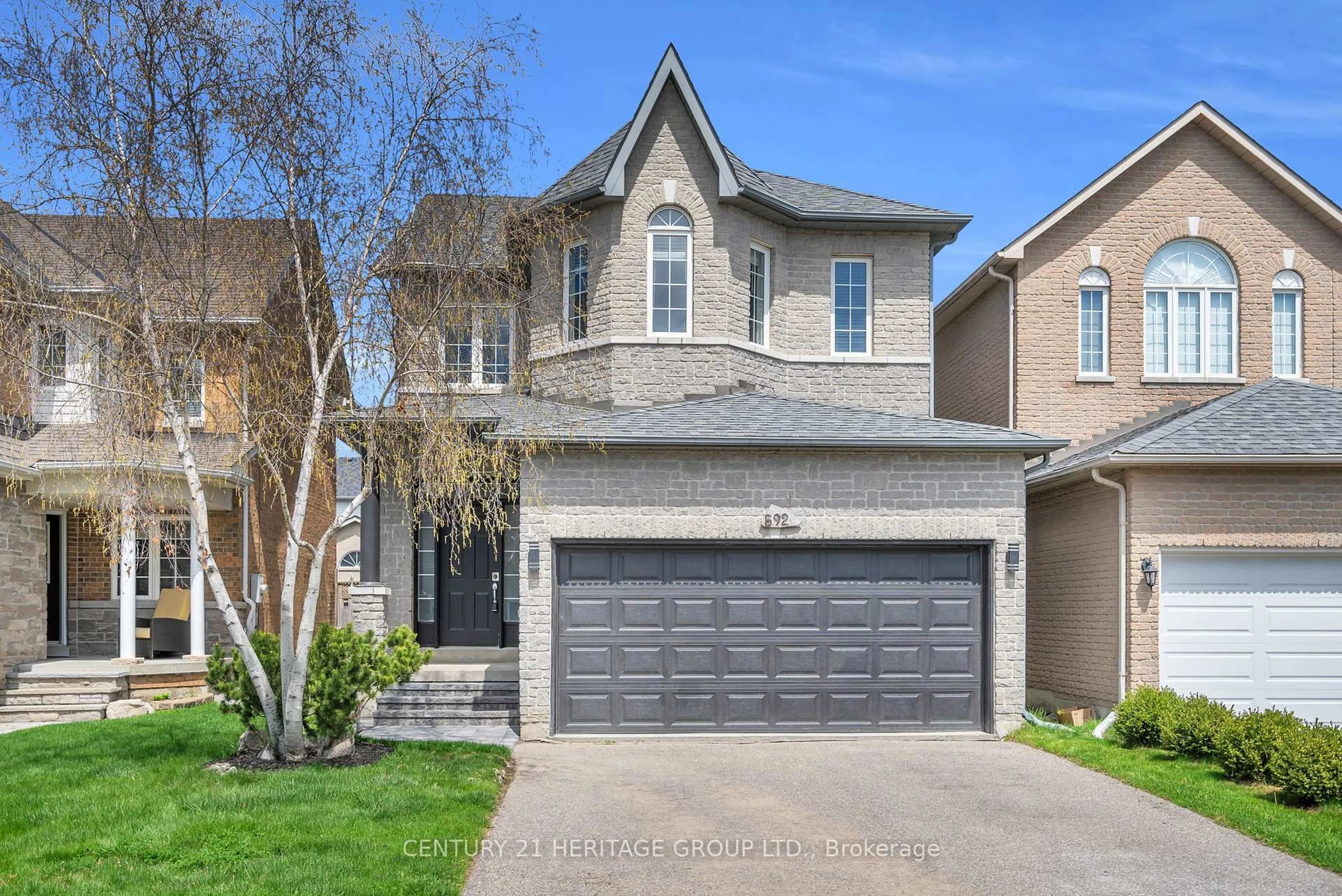 Home with brick exterior material, street for 592 Heddle Cres, Newmarket Ontario L3X 2J5