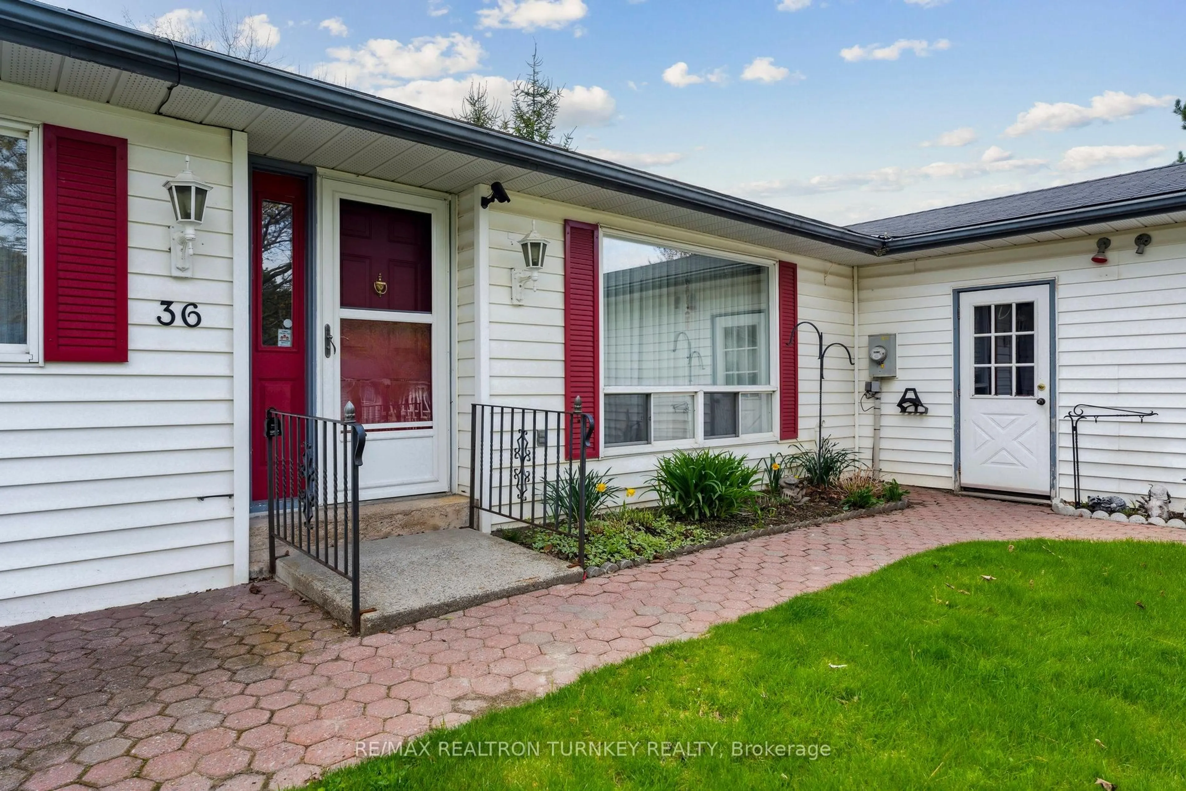 Home with vinyl exterior material, street for 36 Tecumseth Pines Dr, New Tecumseth Ontario L0G 1W0