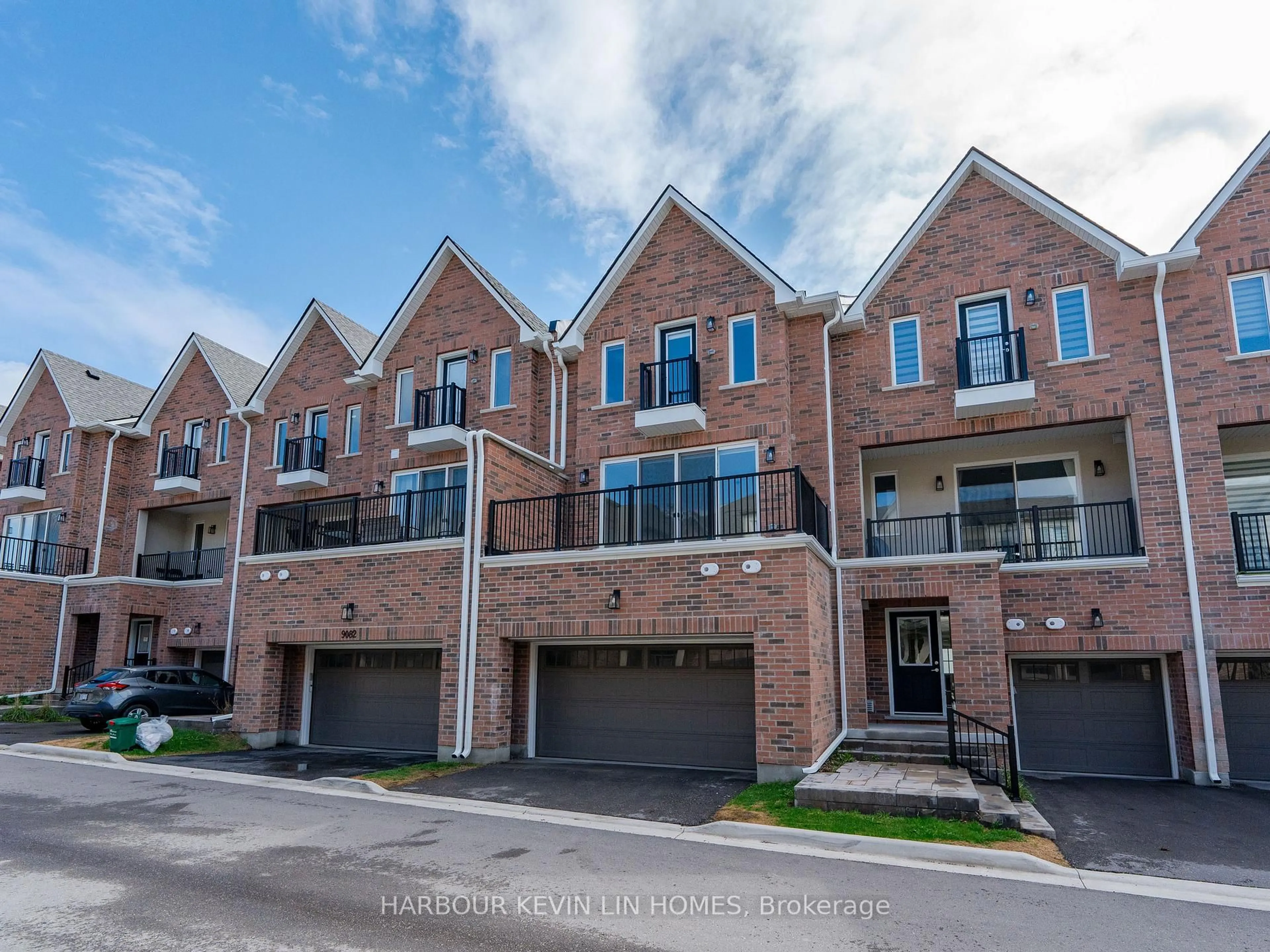 Home with brick exterior material, street for 9080 Woodbine Ave, Markham Ontario L3R 0J8